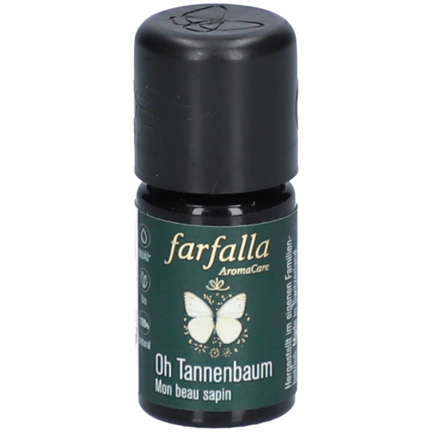 Kleine glazen fles met zwarte dop. Opschrift: farfalla AromaCare, Oh Tannenbaum, Mon beau sapin. Groene achtergrond.