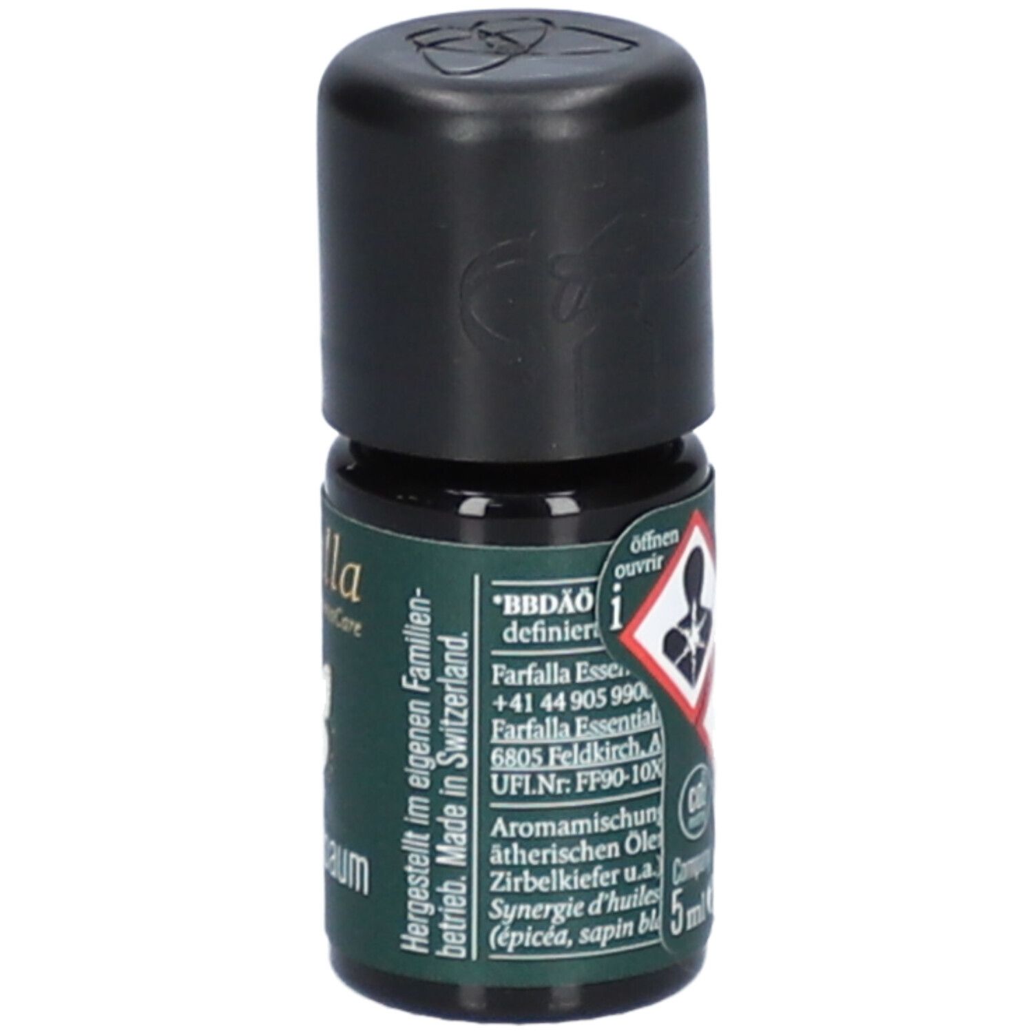 Kleine glazen fles met zwarte dop. Opschrift: farfalla AromaCare, Oh Tannenbaum, Mon beau sapin. Waarschuwingen, 5ml.