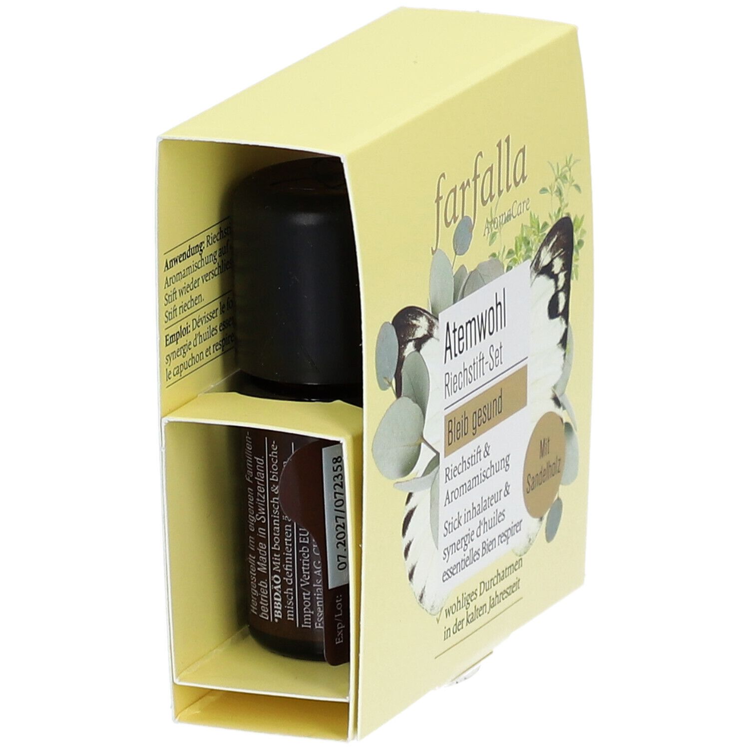 Emballage jaune avec produit et flacon. Flacon avec liquide brun. Texte : Ensemble de bâtonnets olfactifs, Avec bois de santal.
