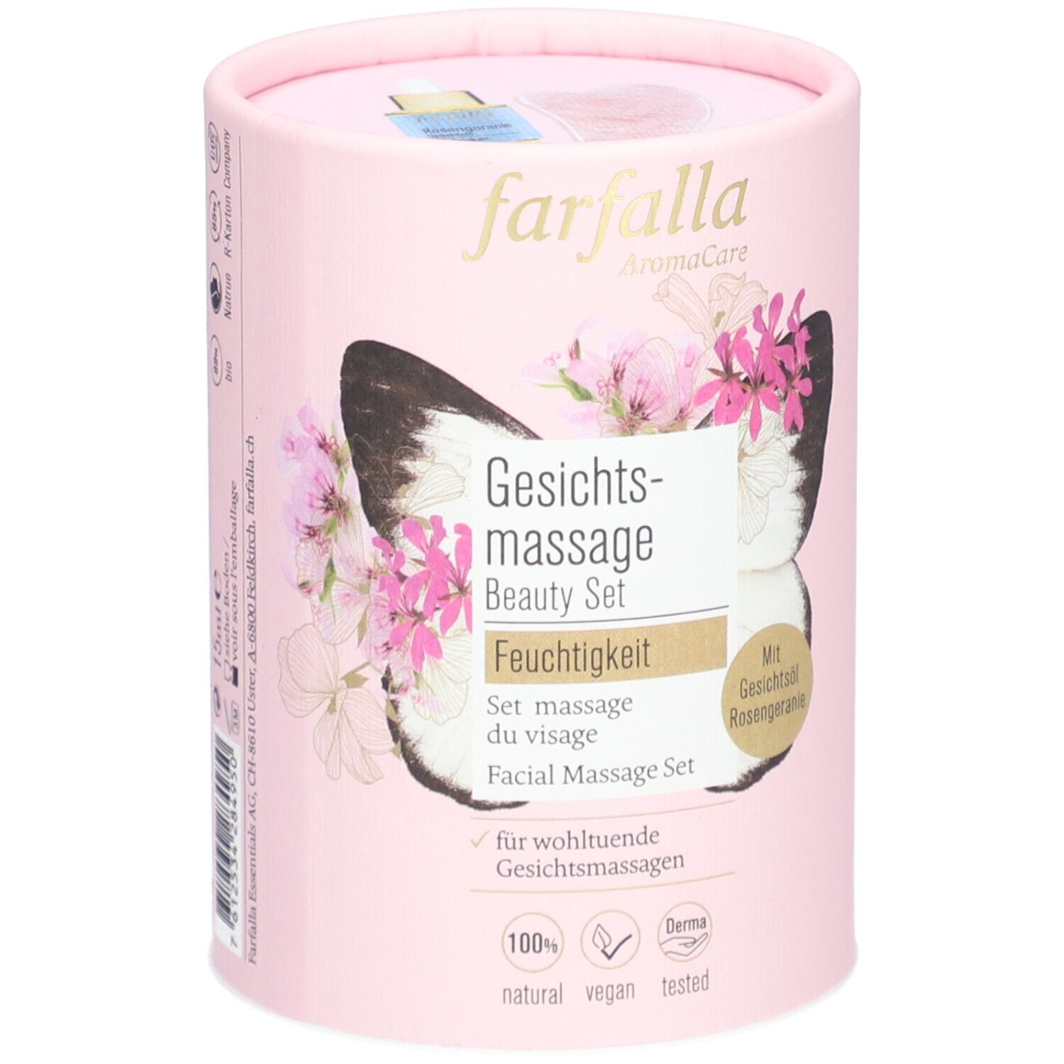 Roze cilindrische verpakking. Opschrift: Farfalla AromaCare, Beauty Set, Vochtigheid. Vlinder- en bloemmotief.