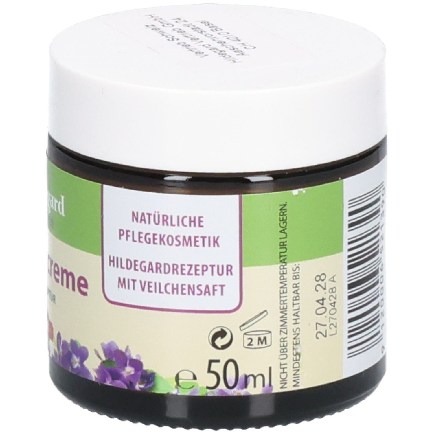Pot en verre brun avec couvercle blanc. Inscription: Cosmétiques naturels. Recette Hildegard avec jus de violette. 50ml. Durée de conservation.