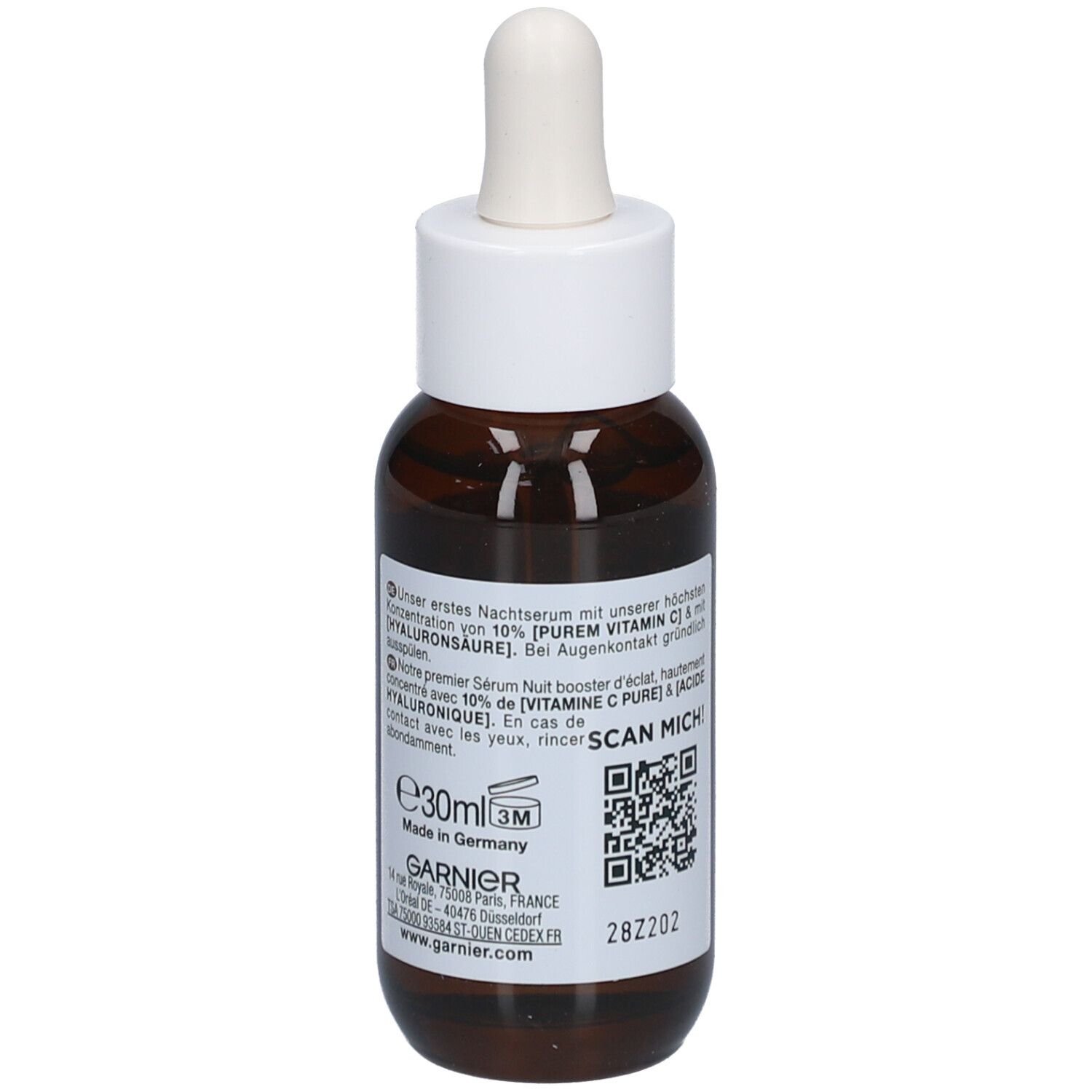 Bruine glazen fles met witte dop en pipet. Etiket met tekst, QR-code en volume-aanduiding. Productnaam niet zichtbaar.