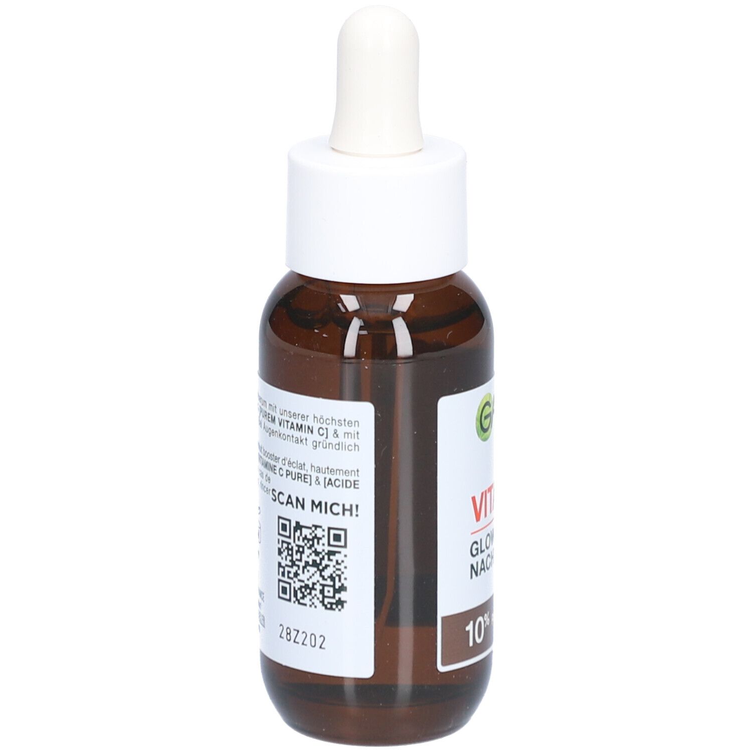 Bruine glazen fles met witte dop en pipet. Etiket met tekst en inhoudsindicatie. Merk Garnier zichtbaar.