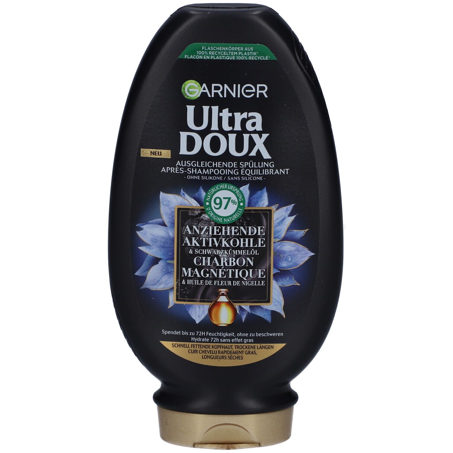 Zwarte fles GARNIER Ultra Doux conditioner met magnetische kool. Voorkant met productnaam en bloemmotief.