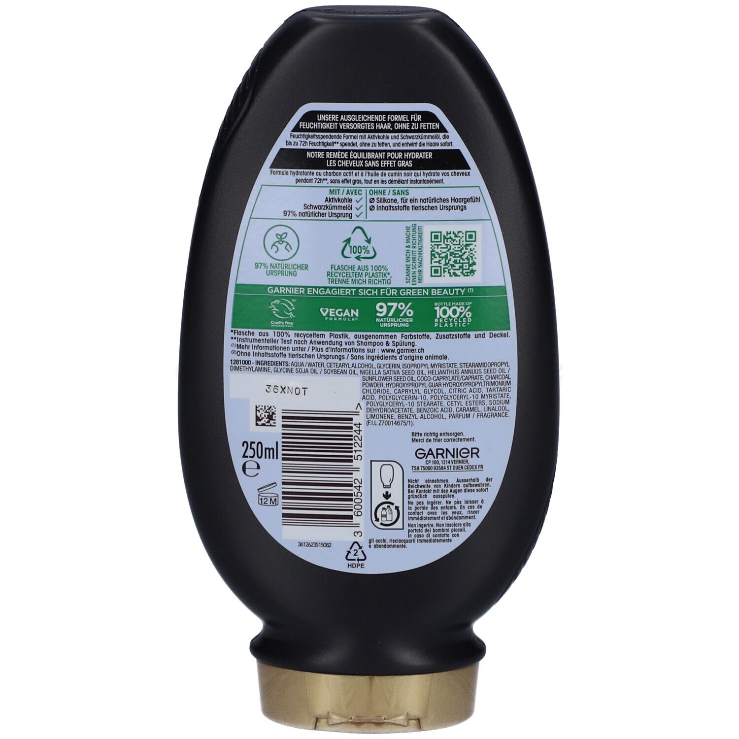 Achterkant van de zwarte GARNIER Ultra Doux fles. Bevat tekst, QR-code, ingrediënten en duurzaamheidsinformatie.