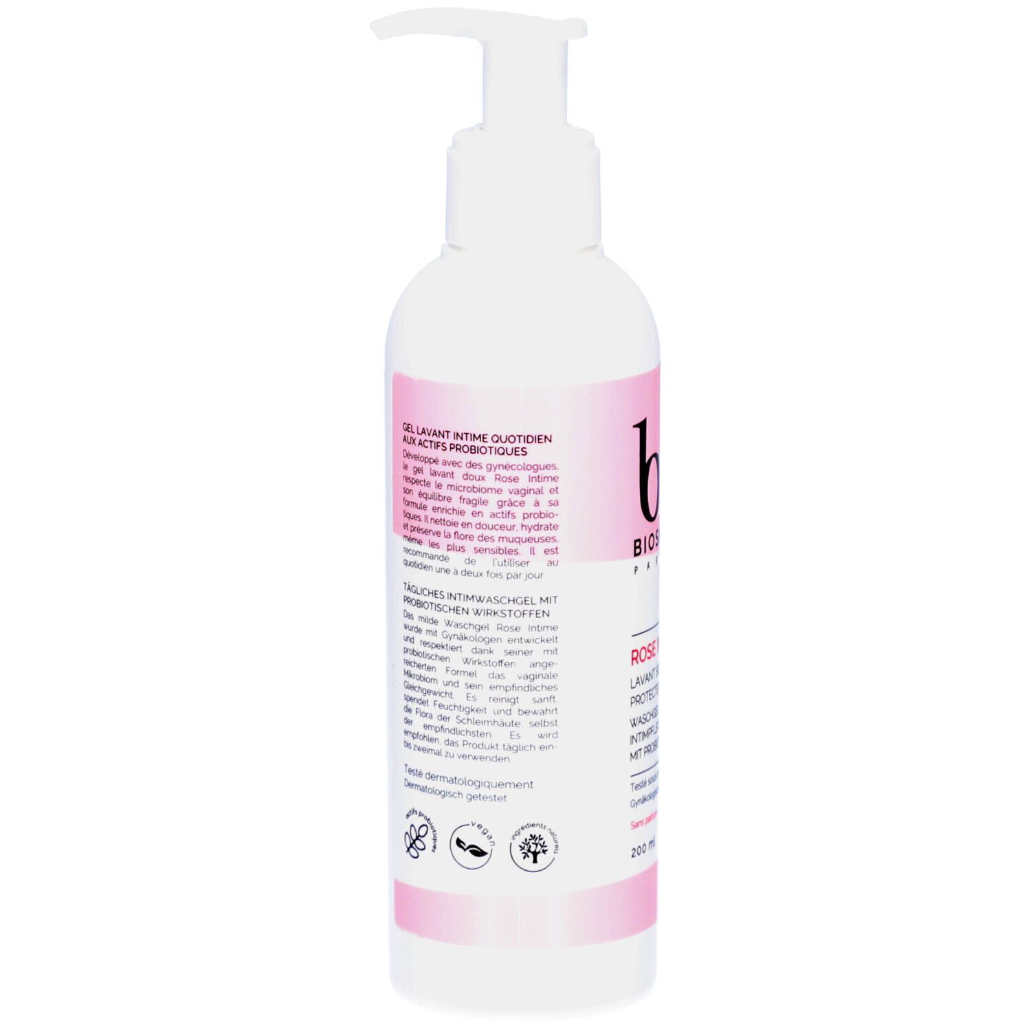 Achterkant van de witte fles. Meertalige tekst. Roze accent. Met ingrediënten en certificeringen.