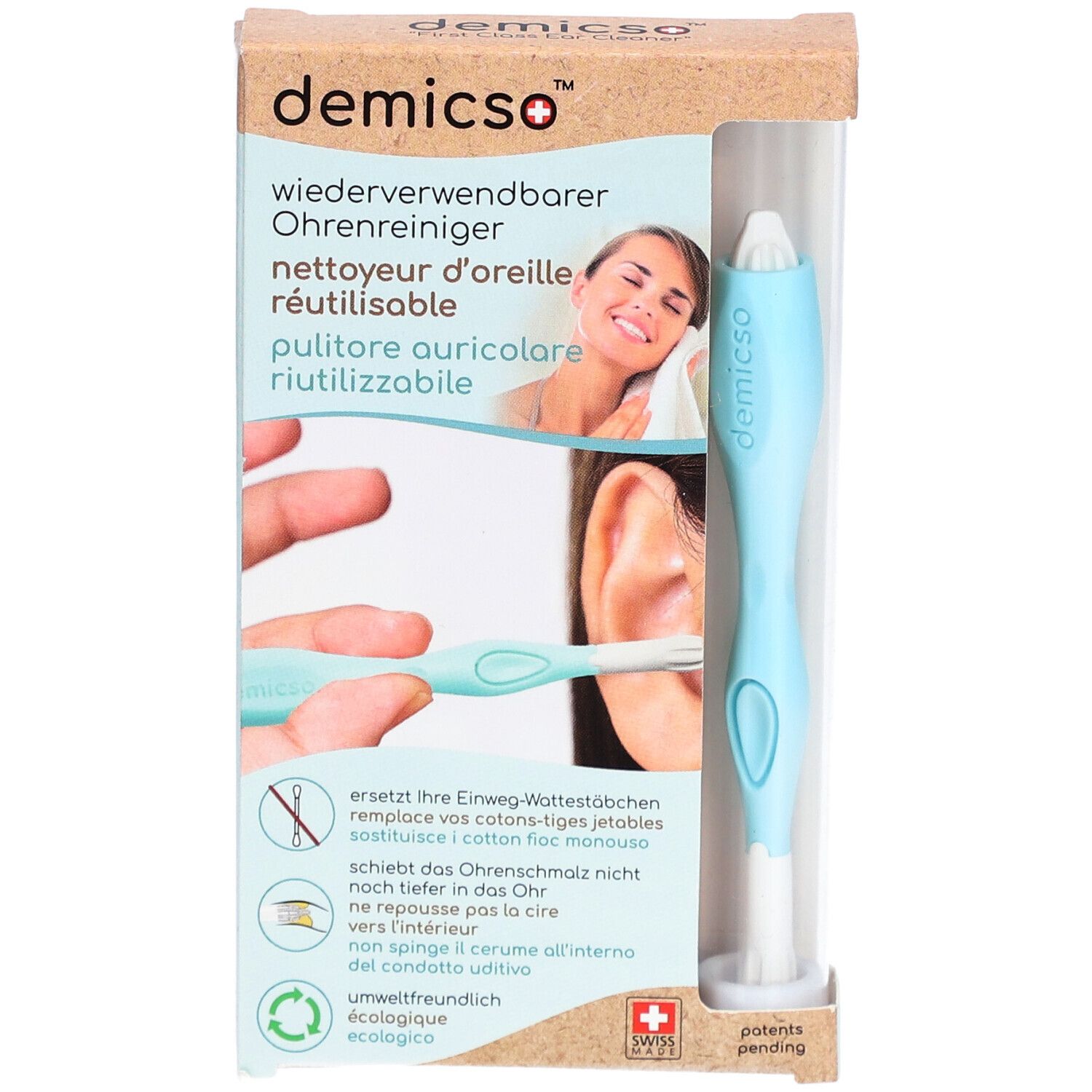 Oorreiniger in verpakking. Lichtblauwe handgreep, witte kop. Productnaam en logo zichtbaar. Transparante verpakking.