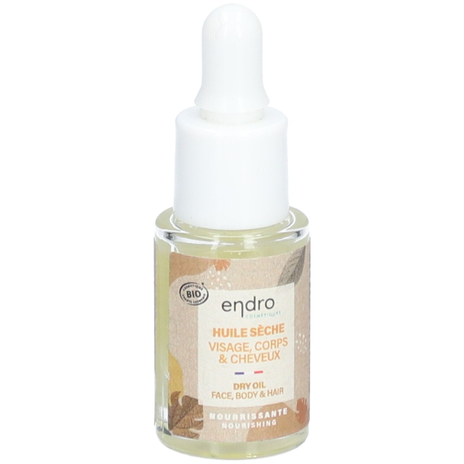 Petite bouteille en verre avec pipette. Étiquette avec informations produit et label bio. Texte: Huile Seche, Visage, Corps & Cheveux.