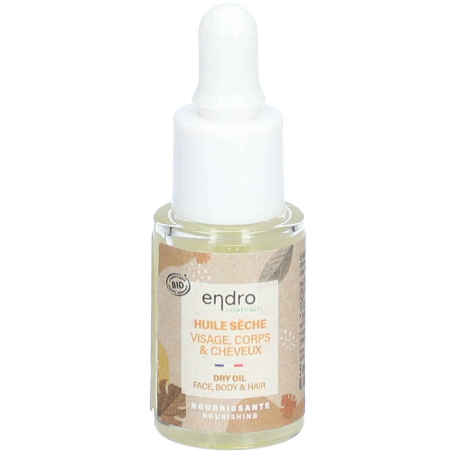 Petite bouteille en verre avec pipette. Étiquette avec informations produit et label bio. Texte: Huile Seche, Visage, Corps & Cheveux.