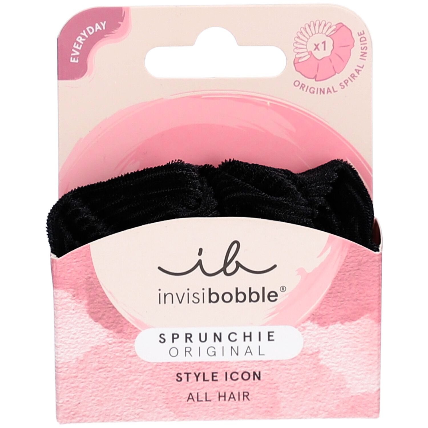 Zwarte INVISIBOBBLE Sprunchie in verpakking. Roze doos met productnaam en logo. "Original Spiral Inside".
