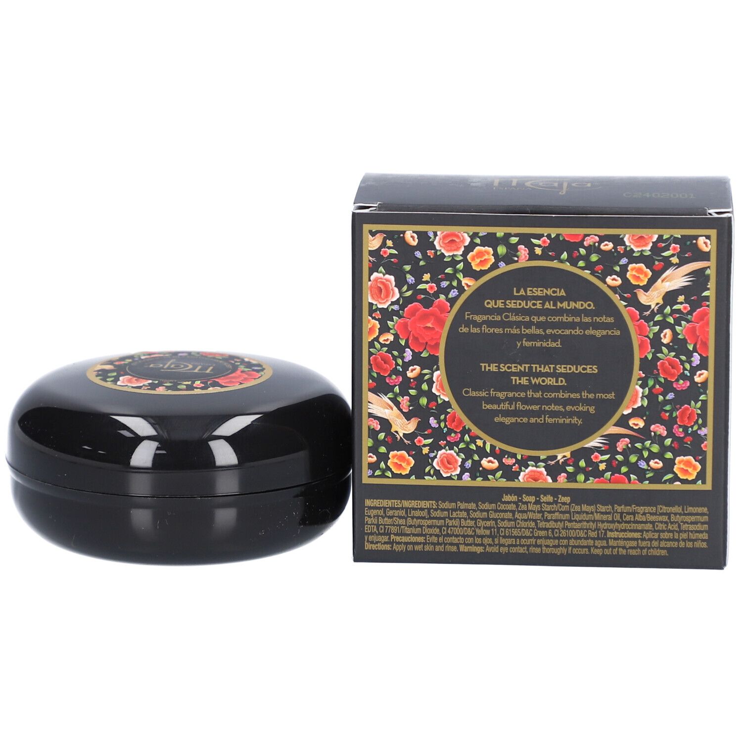 Zeep en verpakking. Zwarte ovale zeep en verpakking met bloemenpatroon. Tekst op verpakking.