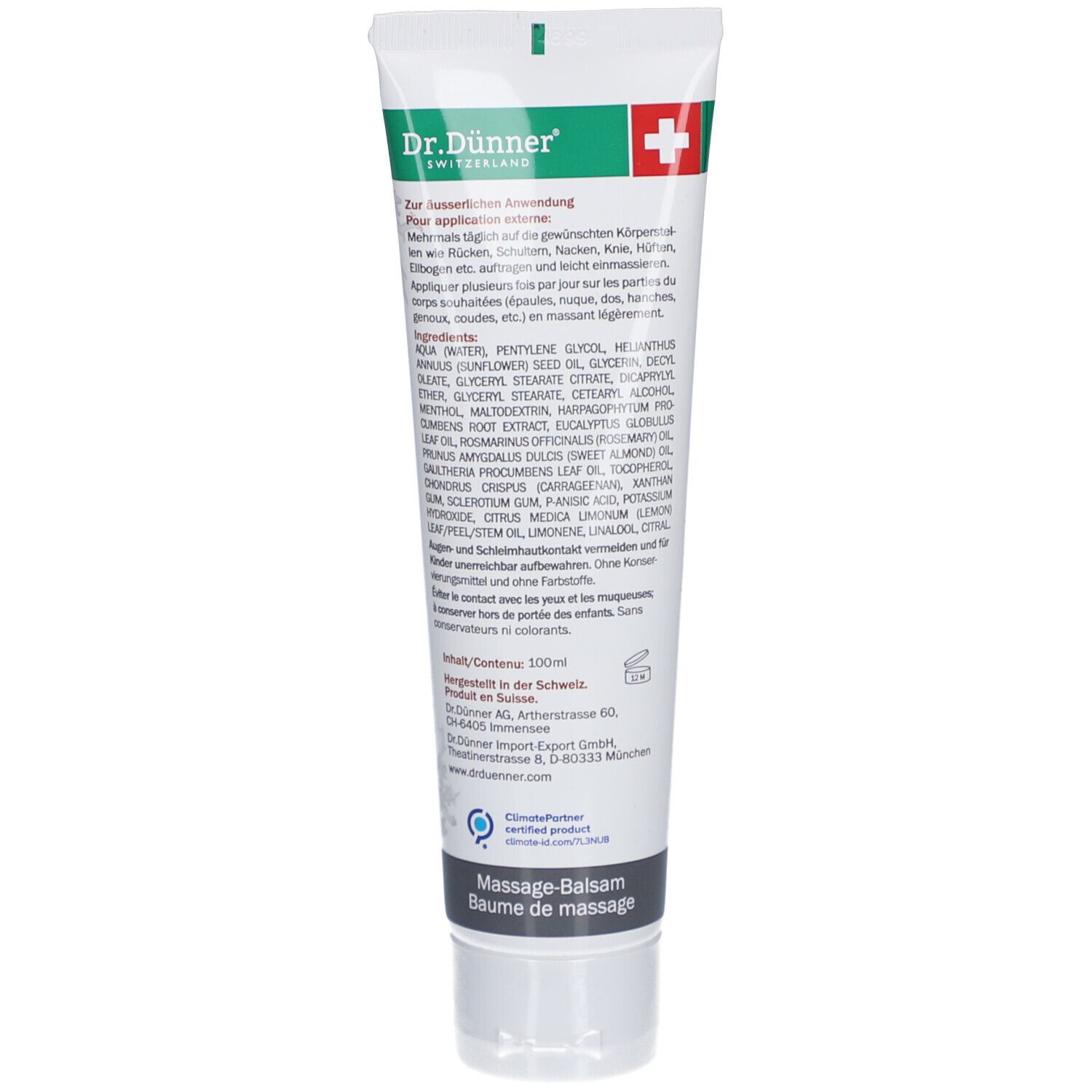 Dos du tube de crème. Texte avec ingrédients et informations du fabricant. Couleurs vert et blanc.