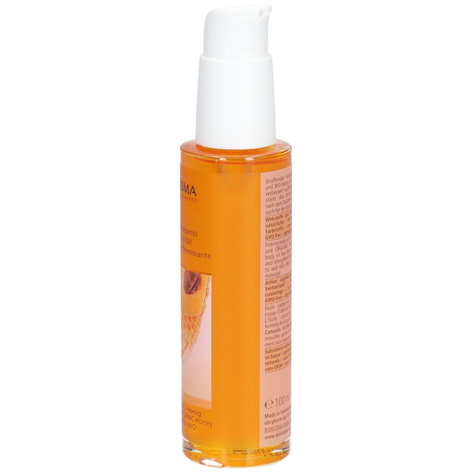 Body oil fles, zijaanzicht. Oranje olie, etiket met tekst. BIOKOSMA Swiss Natural Cosmetics.