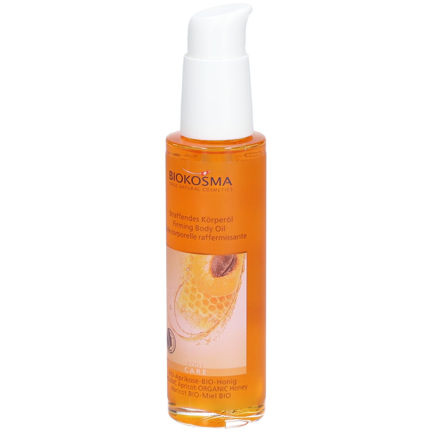 Body oil fles met doseerpomp. Oranje olie, etiket met tekst en logo. BIOKOSMA Swiss Natural Cosmetics.