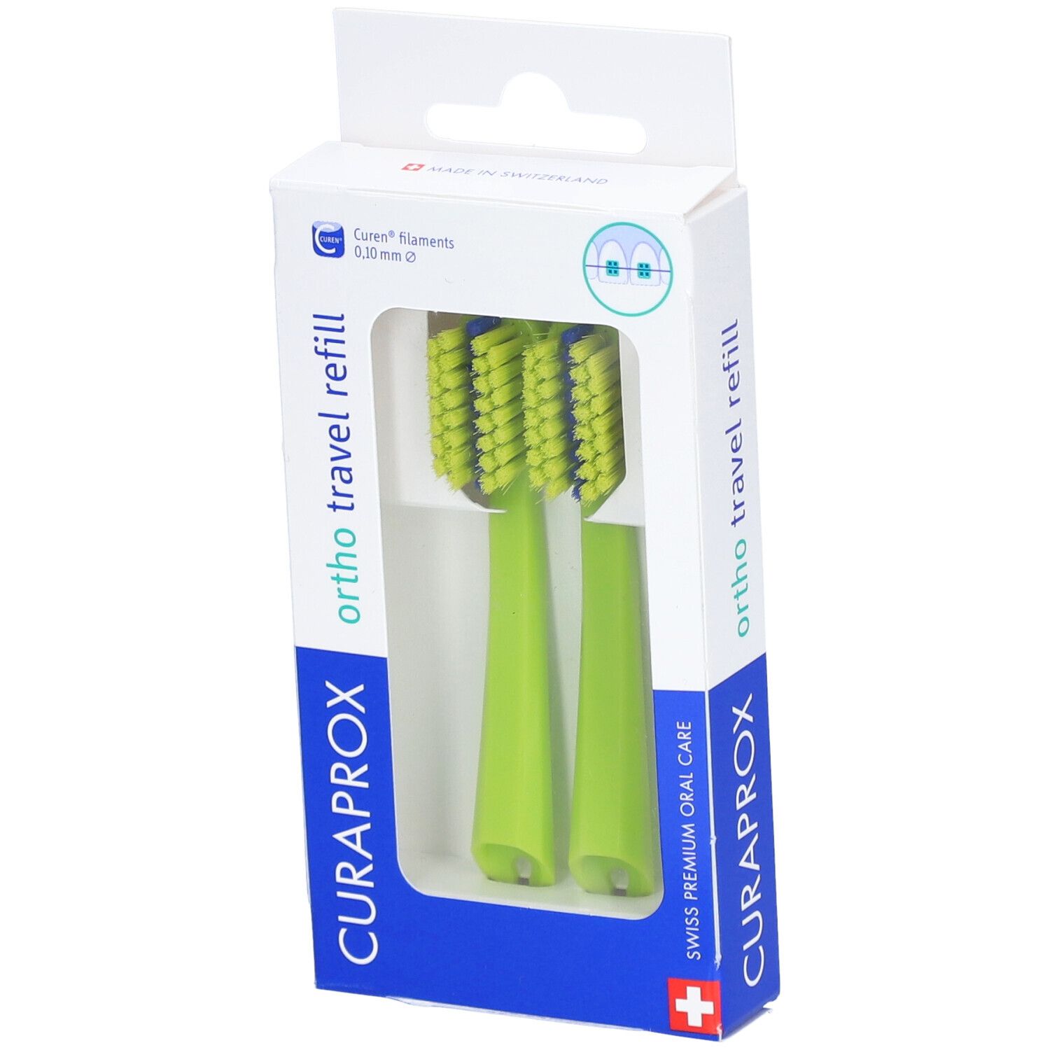 Twee groene opzetborstels in verpakking. Blauwe borstelharen. "CURAPROX" en "ortho travel refill" zichtbaar.