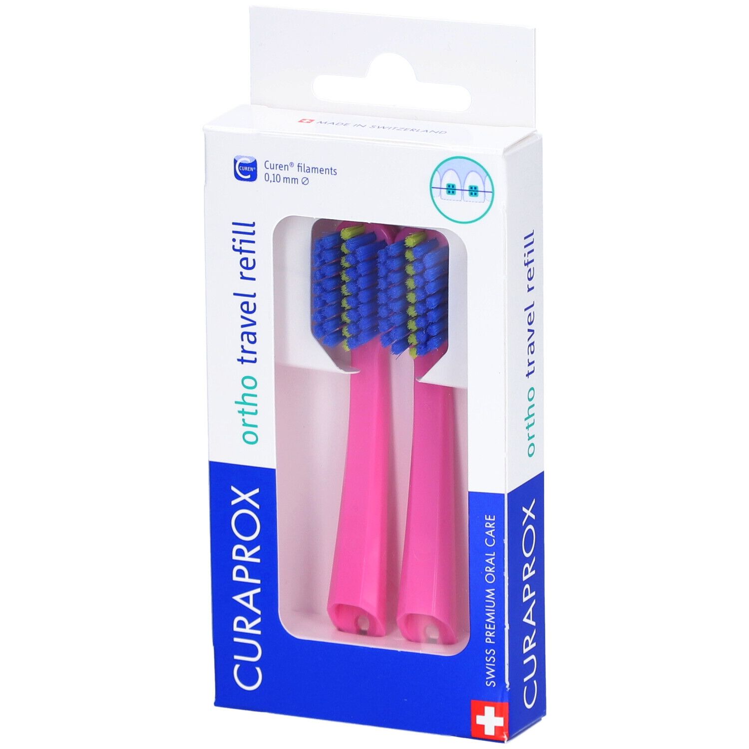 Deux têtes de brosse à dents roses dans un emballage. Soies bleues et jaunes. Emballage avec nom et logo du produit.