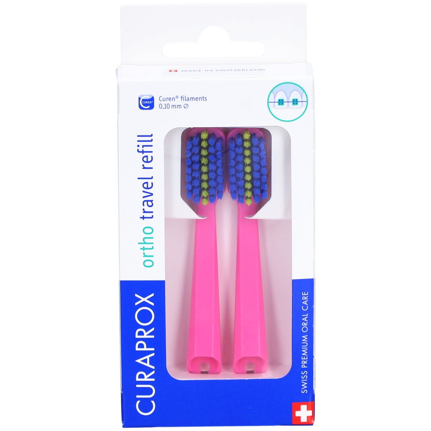 Deux têtes de brosse à dents roses dans un emballage. Soies bleues et jaunes. Emballage avec nom et logo du produit.
