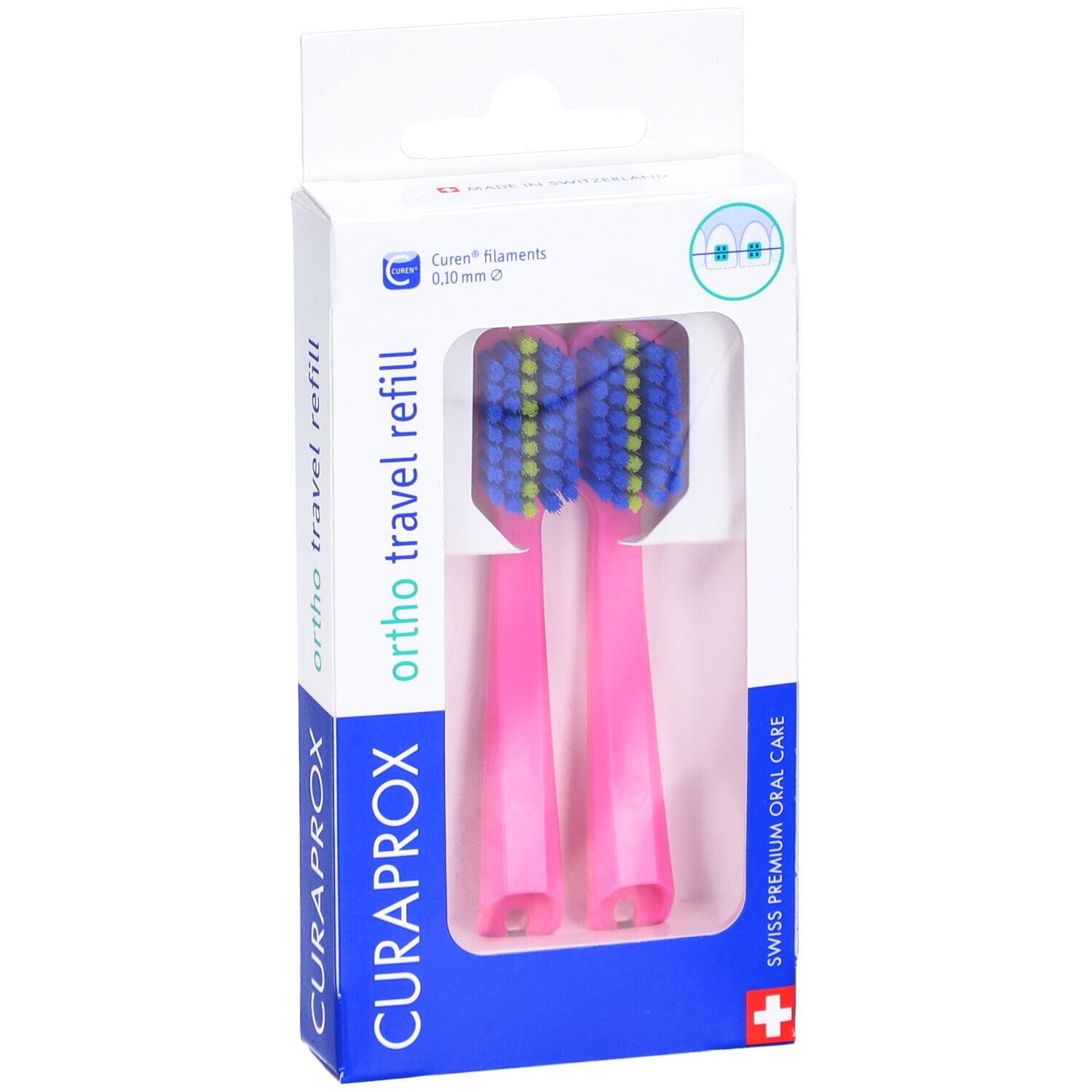 Deux têtes de brosse à dents roses dans un emballage. Soies bleues et jaunes. Emballage avec nom et logo du produit.