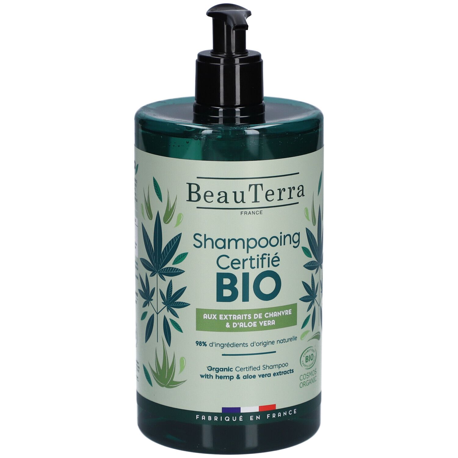 Flacon de shampooing vert avec pompe noire. Inscription: BeauTerra, Shampooing Certifié BIO, Chanvre & Aloe Vera. Label bio.