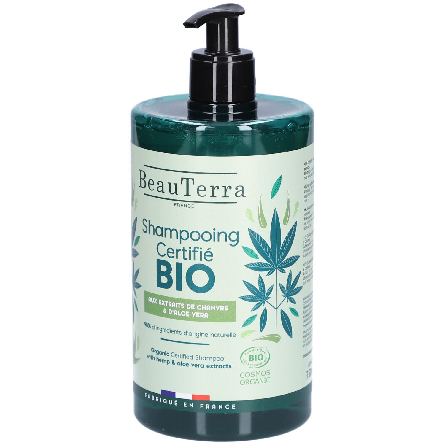 Flacon de shampooing vert avec pompe noire. Inscription: BeauTerra, Shampooing Certifié BIO, Chanvre & Aloe Vera. Label bio.