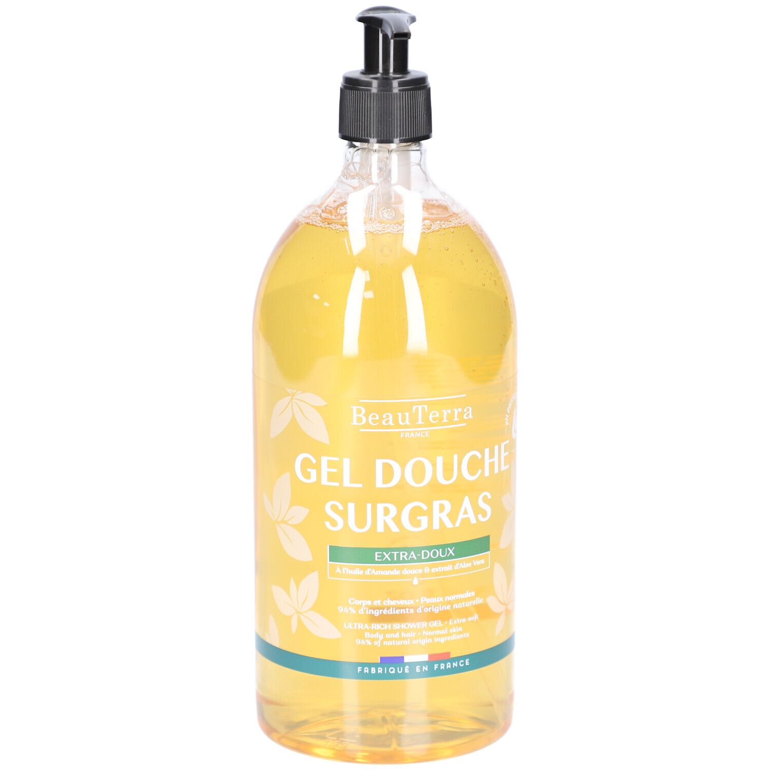 Transparante fles met zwarte pomp. Opschrift: BeauTerra Gel Douche Surgras. Extra-Doux. Gemaakt in Frankrijk.