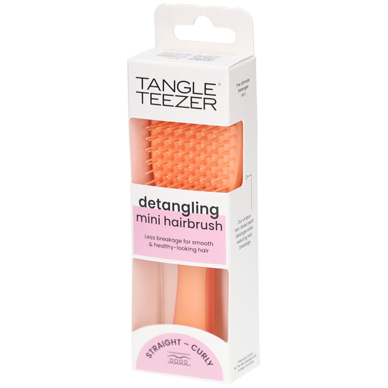 TANGLE TEEZER Wet Detangler Mini borstel in verpakking. Oranje borstelharen, roze handvat. Voor steil en krullend haar.