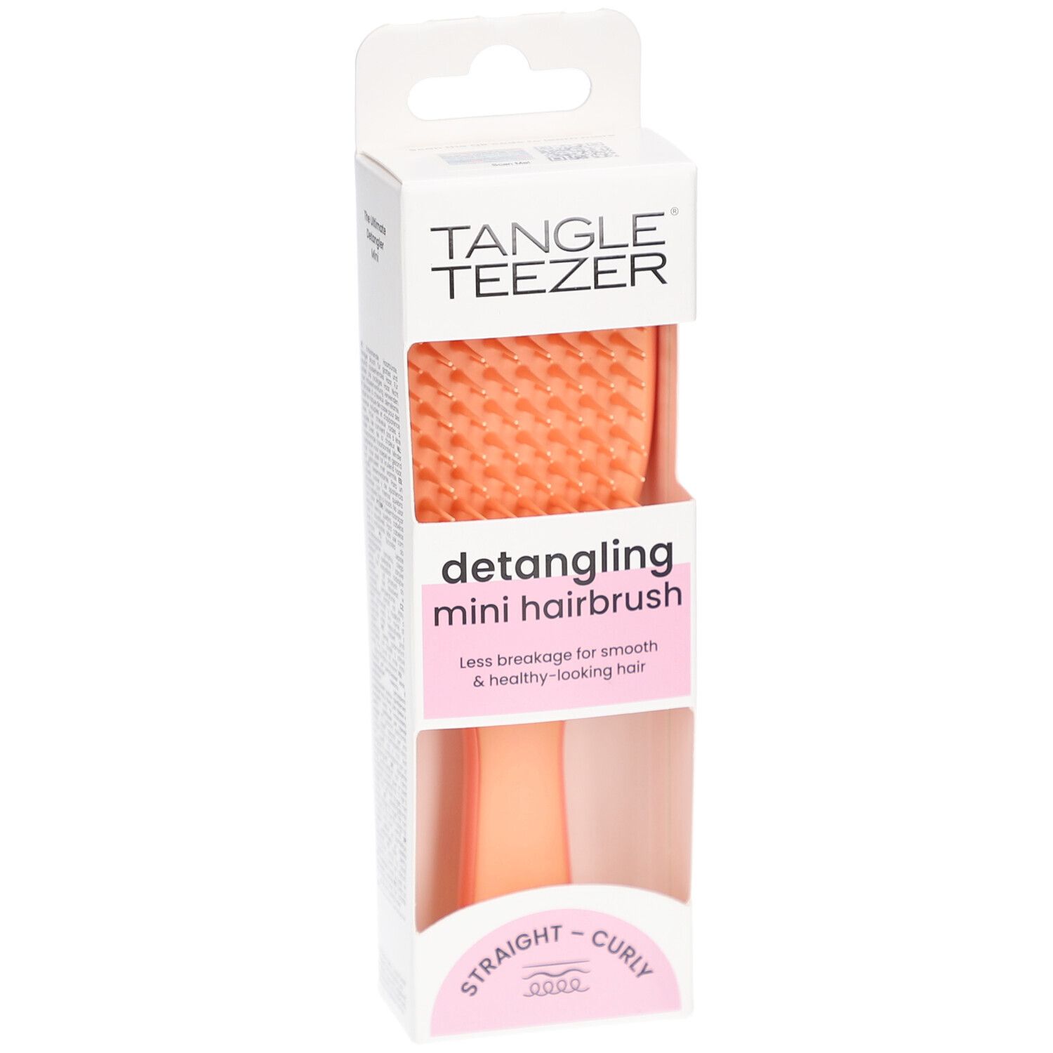 TANGLE TEEZER Wet Detangler Mini borstel in verpakking. Vooraanzicht. Oranje borstelharen, roze handvat. Voor steil en krullend haar.