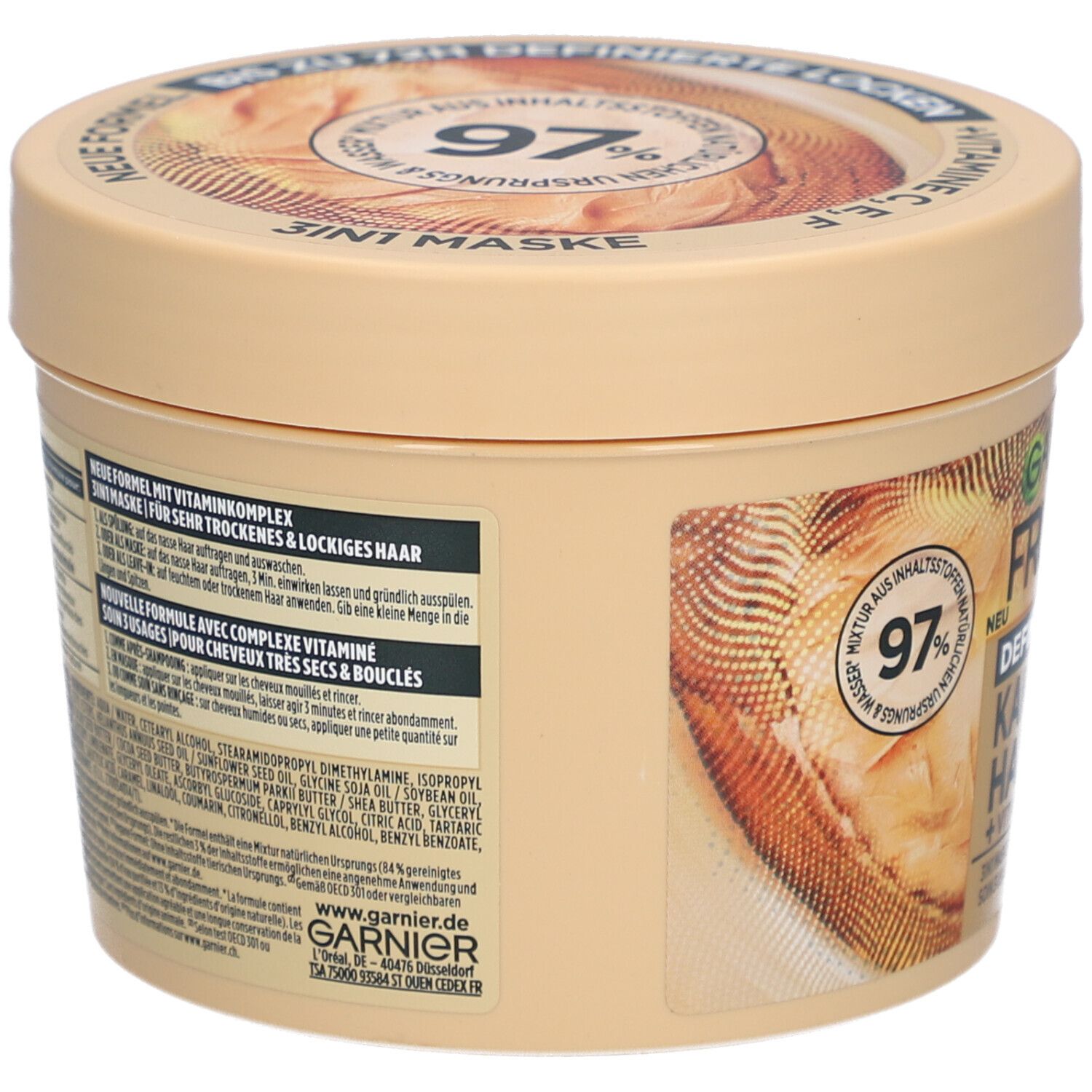 Beige pot Garnier Fructis Hair Food. Achterkant met ingrediënten en informatie. 97% ingrediënten van natuurlijke oorsprong. Vegan.