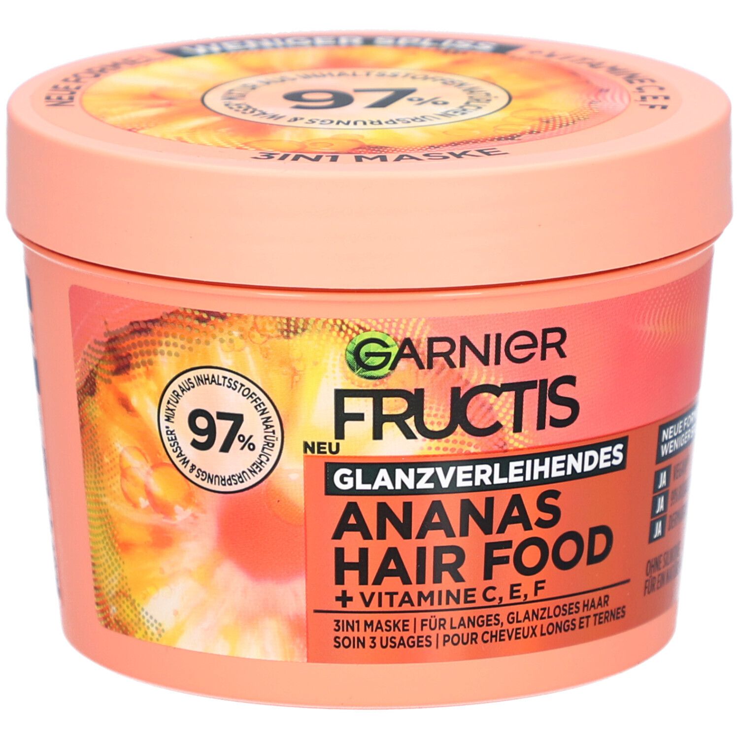 Ronde pot met Garnier Fructis Hair Food Ananas. Opschrift: Glanzverleihendes, 3in1 Maske, + Vitamines C, E, F.