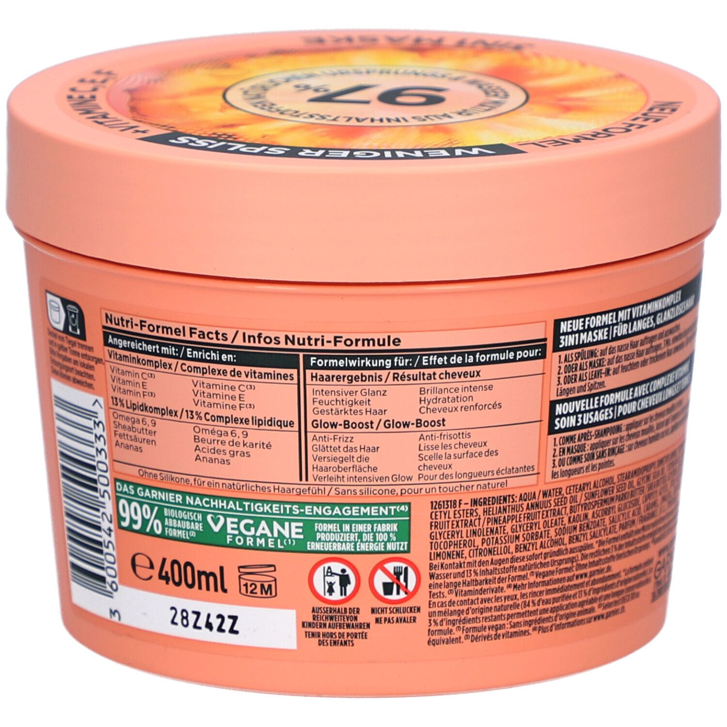 Ronde pot, achterkant, met tekst. Garnier Fructis Hair Food Ananas. Opschrift: 99% natuurlijke ingrediënten, 400ml.