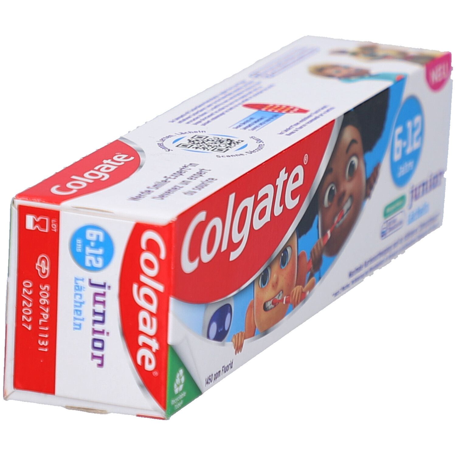 Emballage de dentifrice, en biais. Blanc, rouge et bleu. Inscription : Colgate, Junior 6-12 ans. Illustration de deux enfants de dessin animé. Avec impression 02/2027.