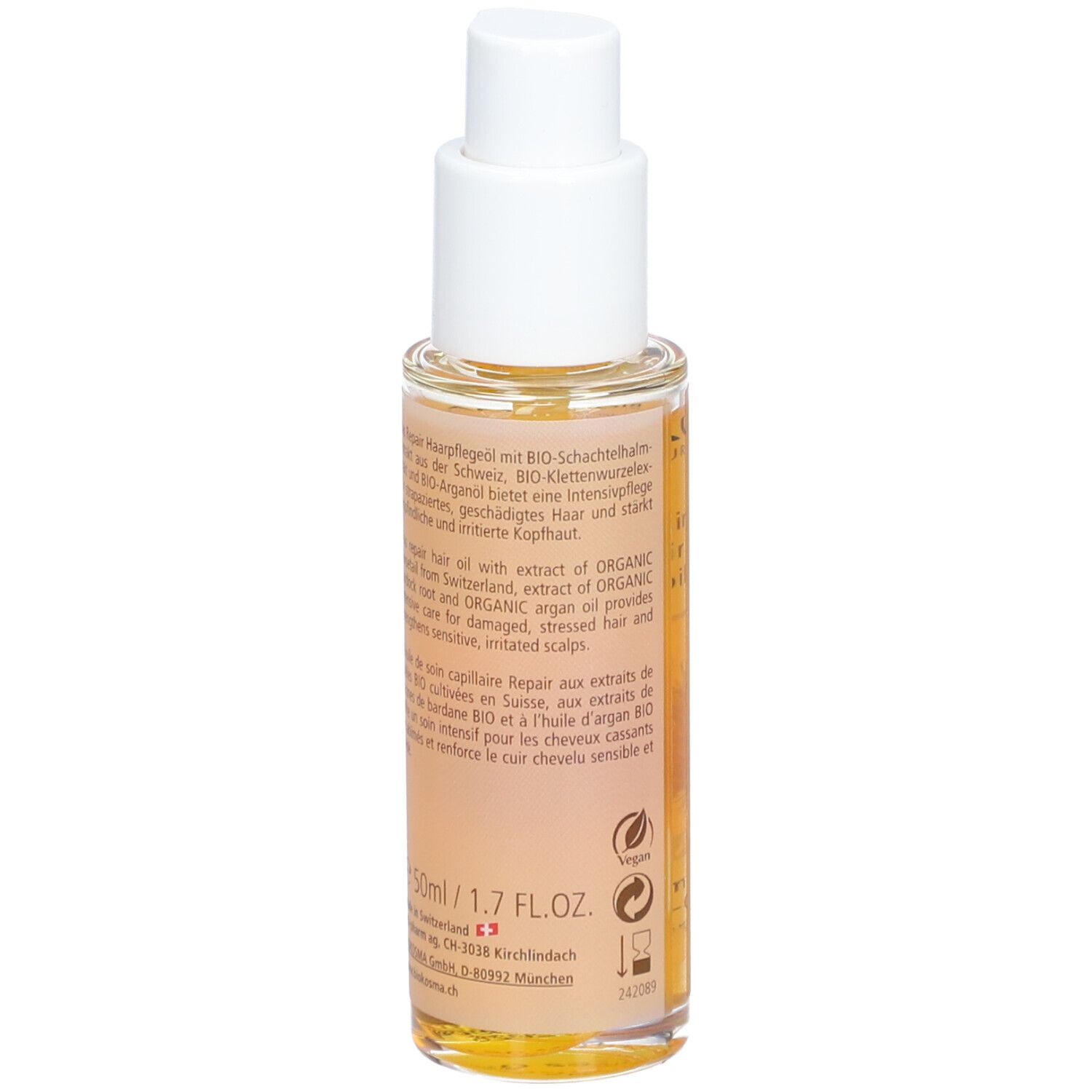 BIOKOSMA Repair Haarolie. Fles met pompsluiting. Achterkant met tekst. 50ml/1.7 fl.oz. Vegan logo.