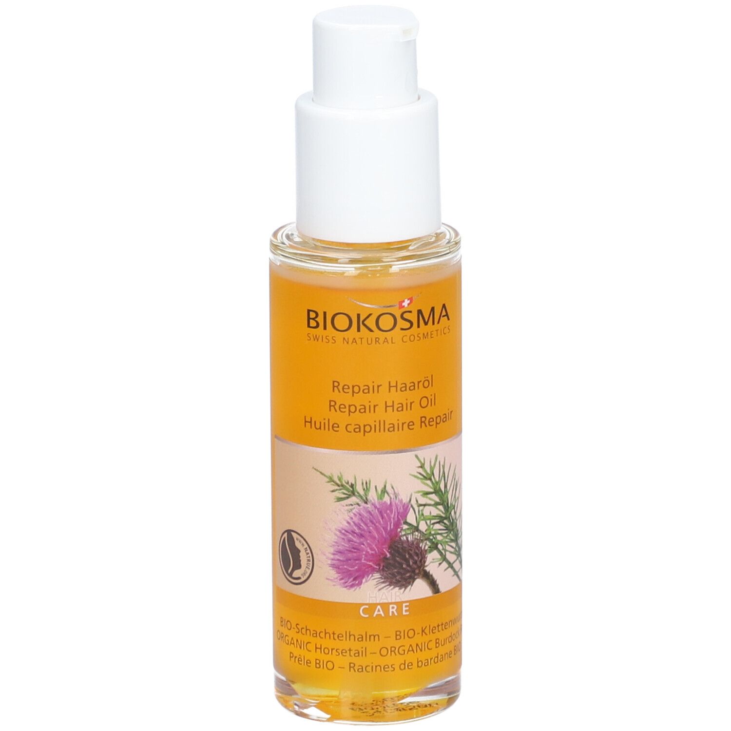 BIOKOSMA Repair Haarolie. Fles met pompsluiting. Etiket met productnaam, illustratie en ingrediënten.