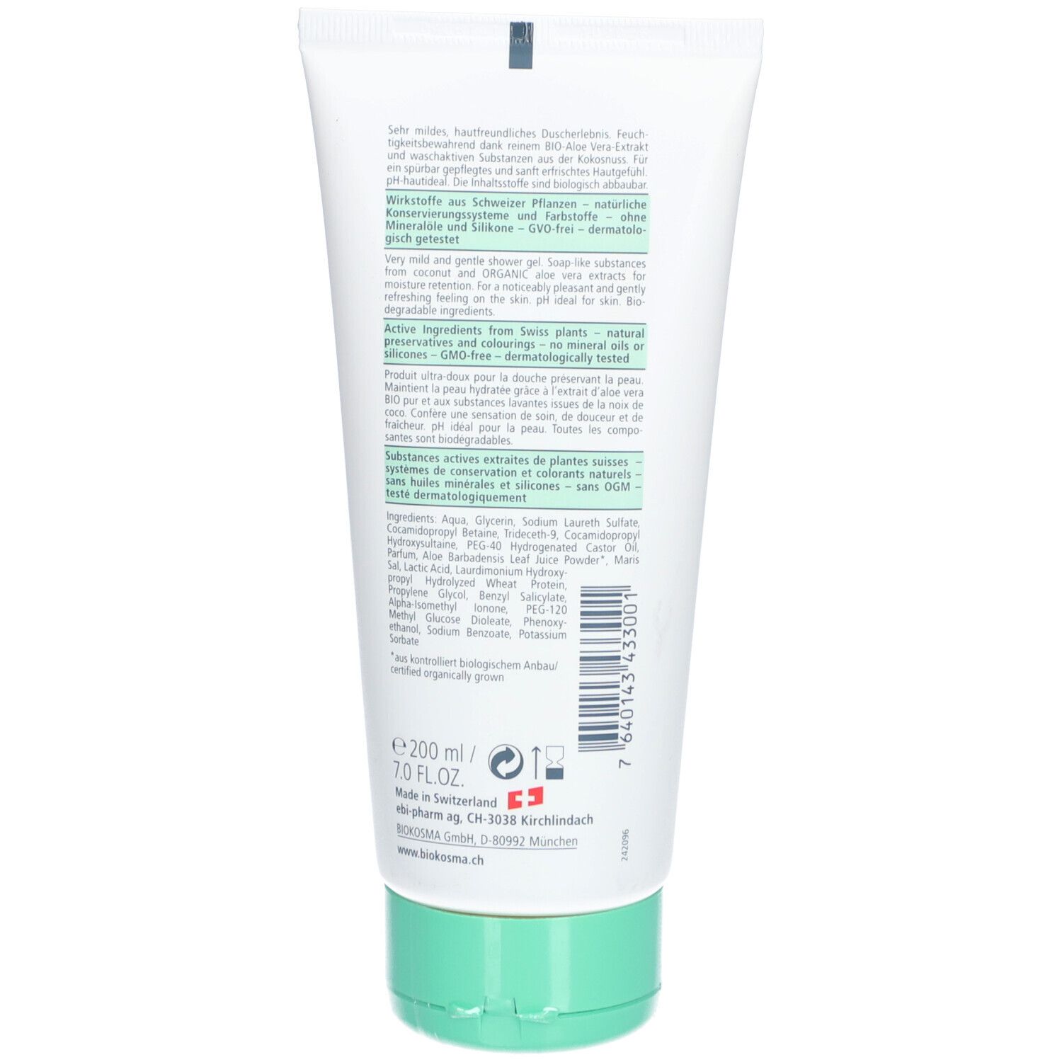 Dos du tube. Texte multilingue. Bouchon à vis vert. Liste des ingrédients. Logo et adresse du fabricant.