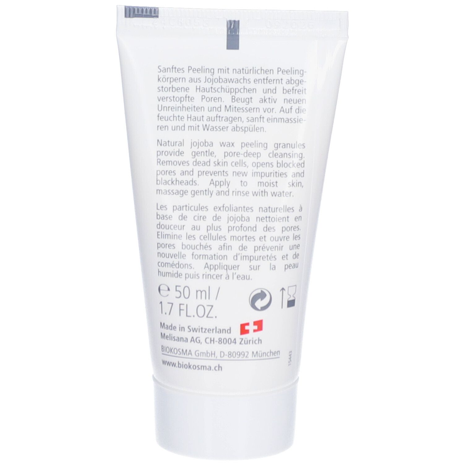 Achterkant van de tube. Tekst in het Duits, Engels en Frans. Bevat informatie over ingrediënten en gebruik.