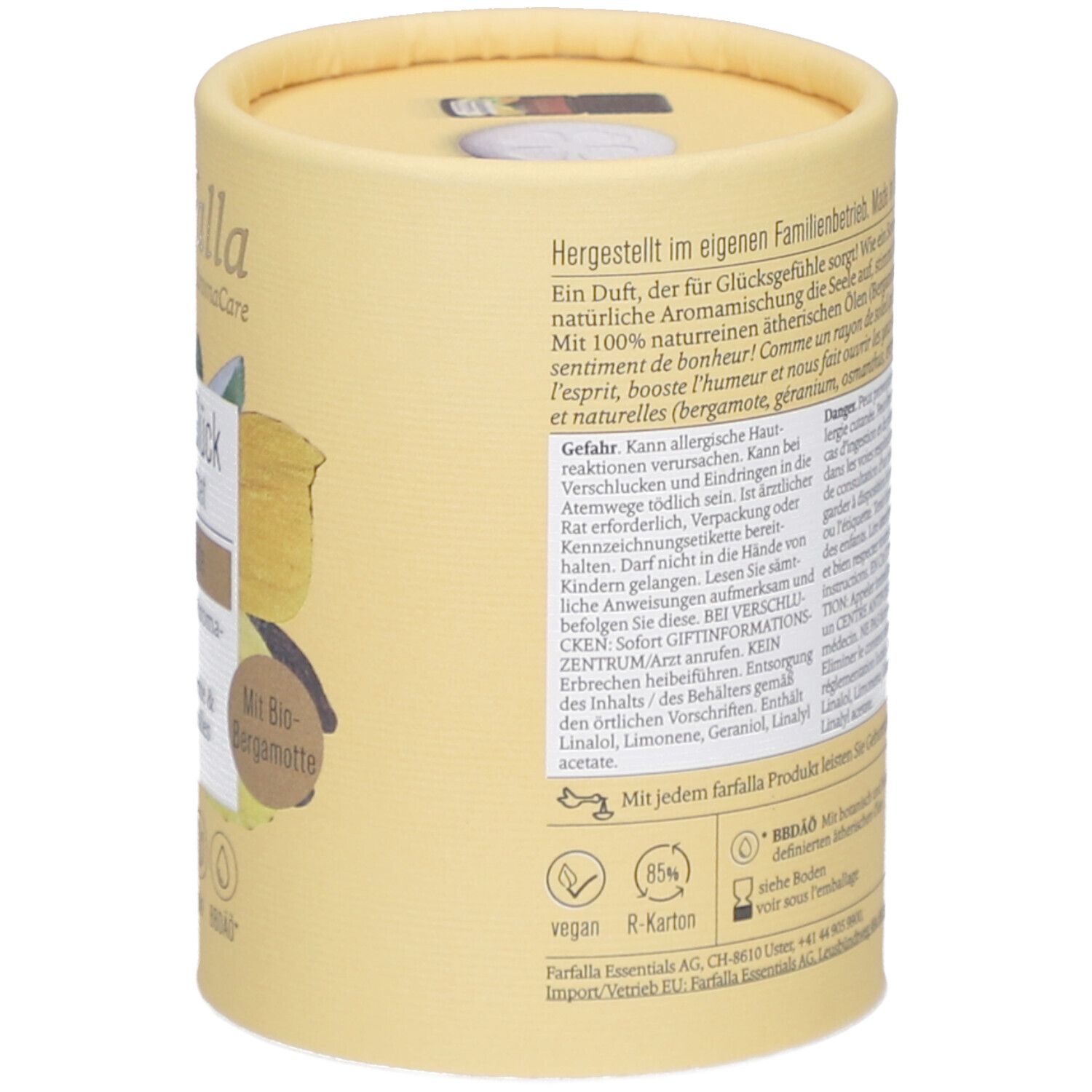 Achterkant cilindrische verpakking. Tekst over productie, ingrediënten, gevarenwaarschuwingen. Vegan, R-karton. Met elk Farfalla product.