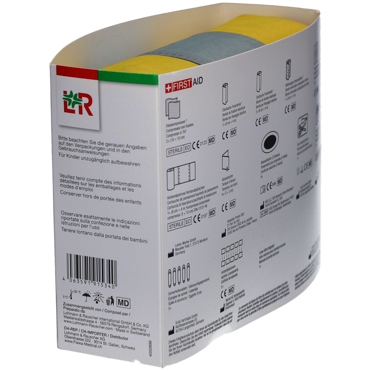 Achterkant van de FLAWA reisapotheek. Pictogrammen, teksten en barcode. Medische CE-markering.