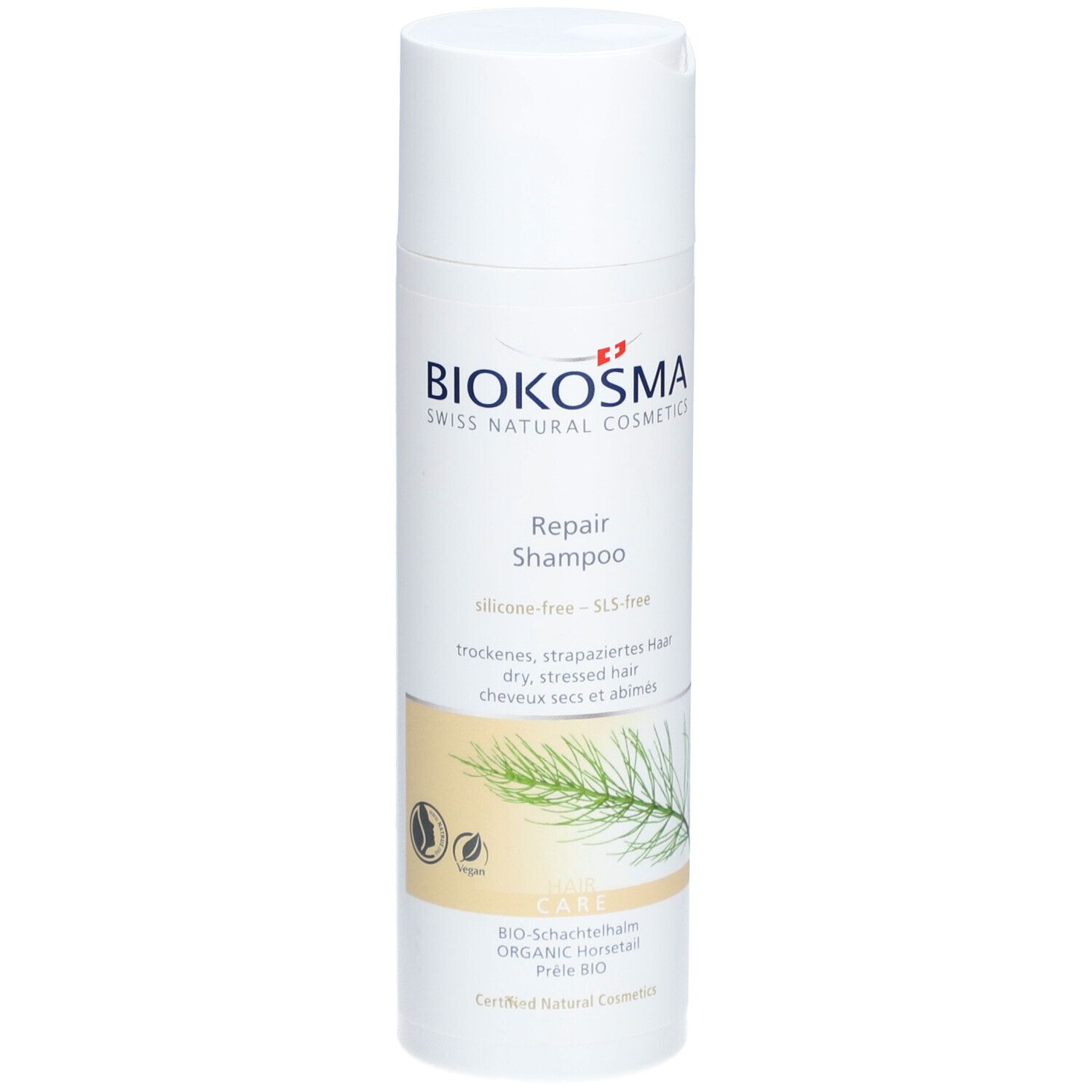 Flacon de shampooing blanc avec logo BIOKOSMA et Repair Shampoo. Labels vegan et illustration de plante.