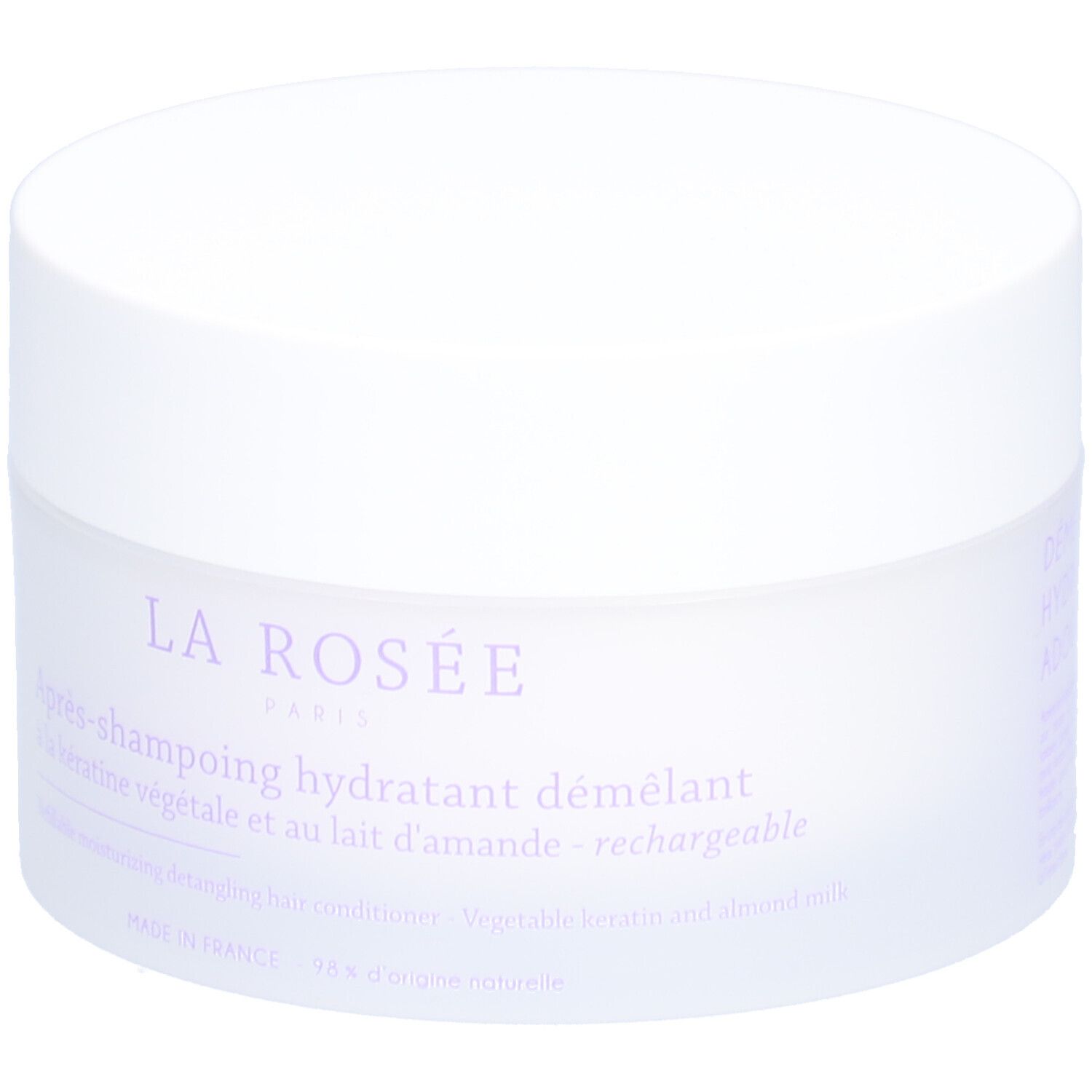 Pot blanc avec couvercle. Inscription: La Rosée Paris, Après-shampooing hydratant démêlant. Textes français et anglais.