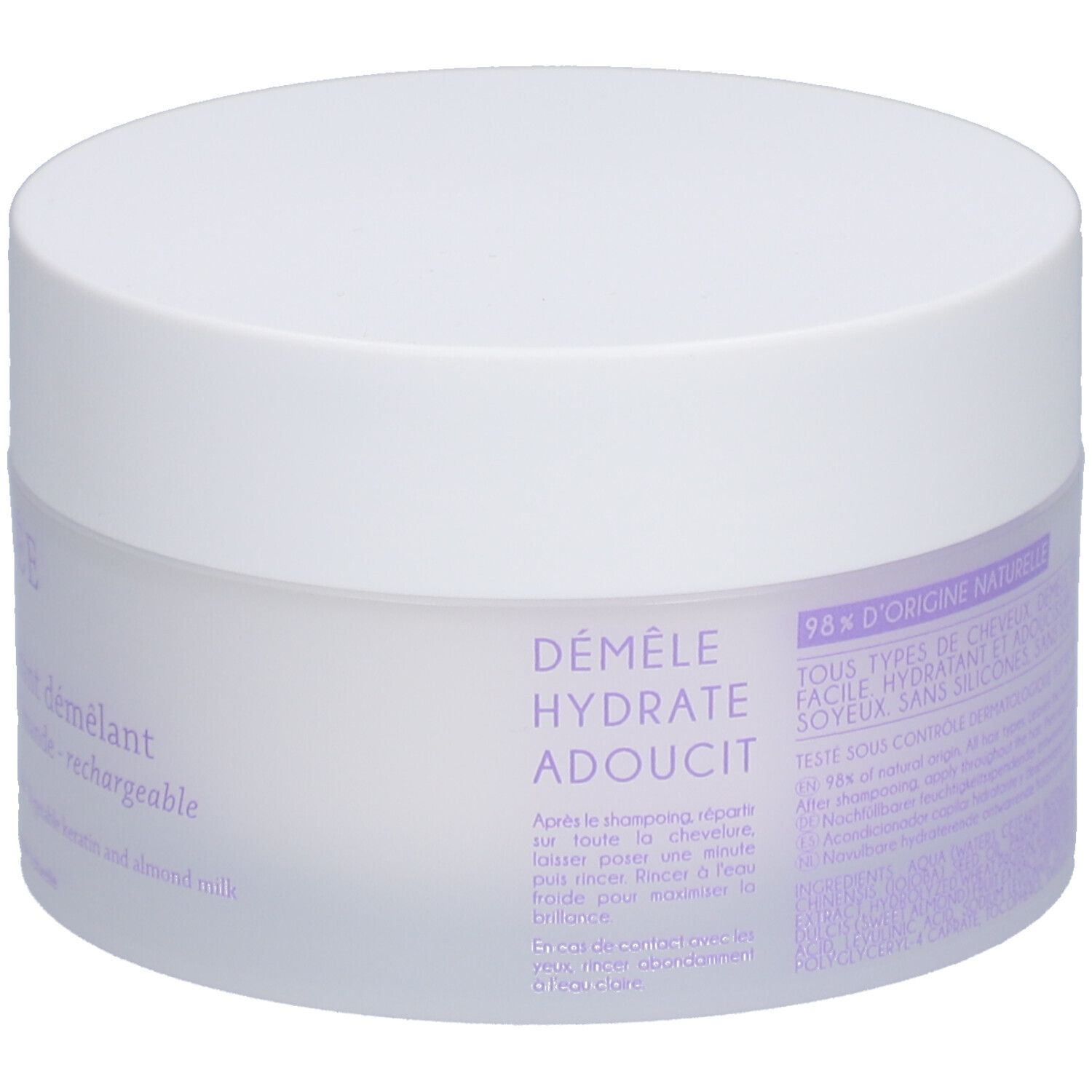 Pot blanc avec couvercle. Inscription: Démêle, hydrate, adoucit. Textes français. Informations produit.