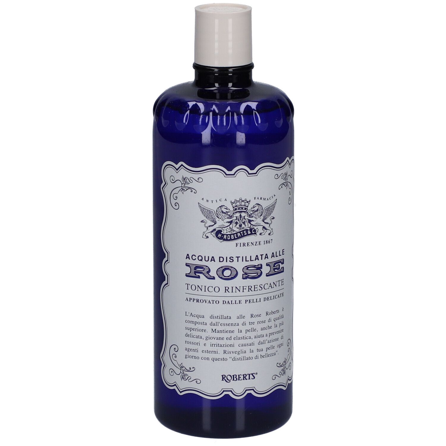 Bouteille bleue avec bouchon blanc. Inscription: ACQUA DISTILLATA ALLE ROSE TONICO RINFRESCANTE. Marque: ROBERTS.