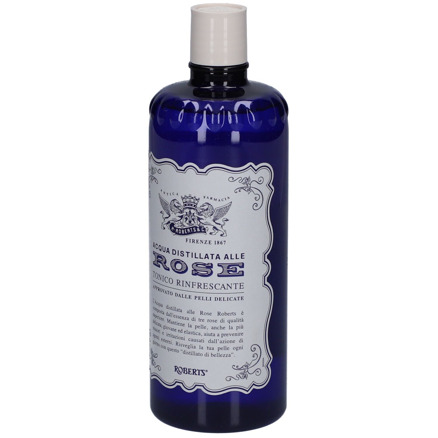 Bouteille bleue avec bouchon blanc. Inscription: ACQUA DISTILLATA ALLE ROSE TONICO RINFRESCANTE. Marque: ROBERTS.