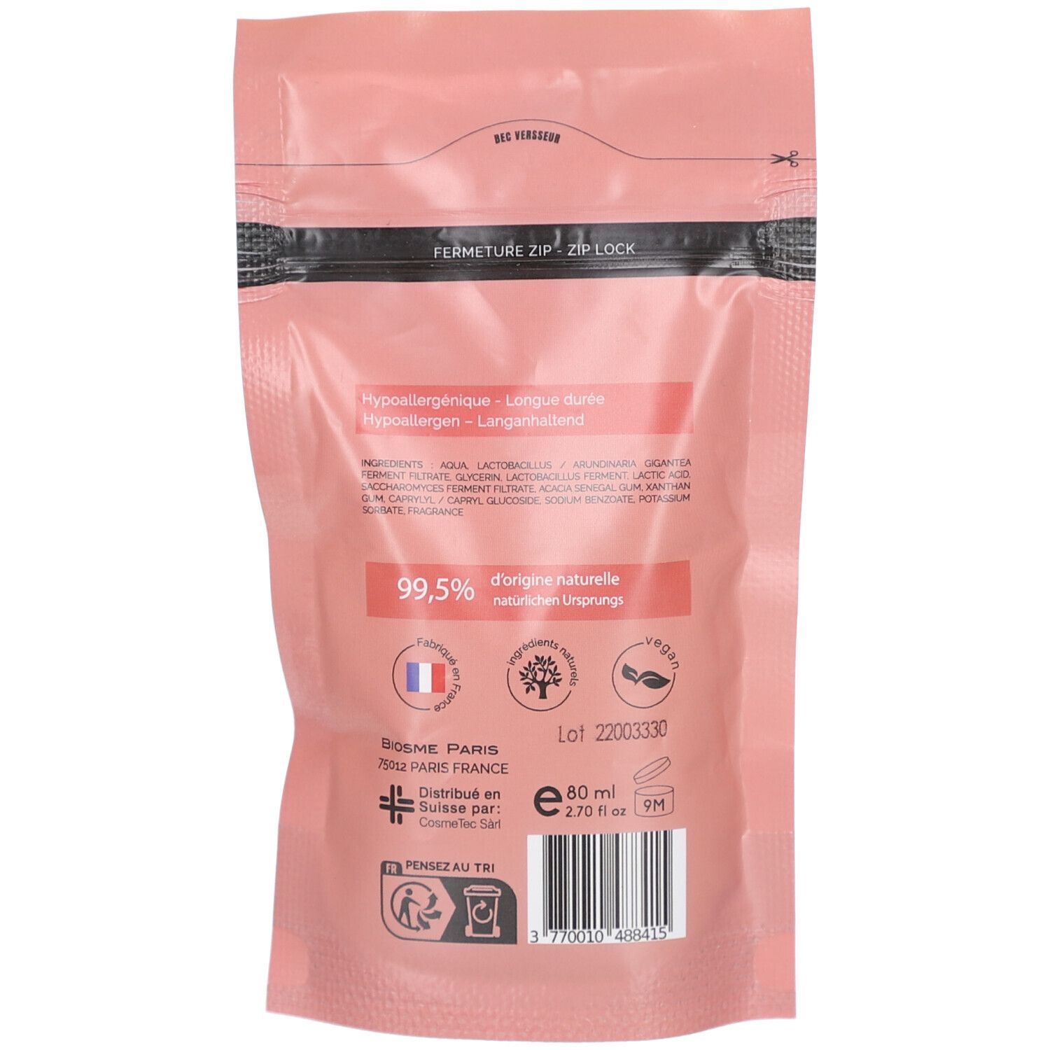 Achterkant van de roze navulverpakking. Tekst: 99,5% natuurlijke oorsprong, vegan. Logo's: boom, vegan-symbool, Franse vlag.