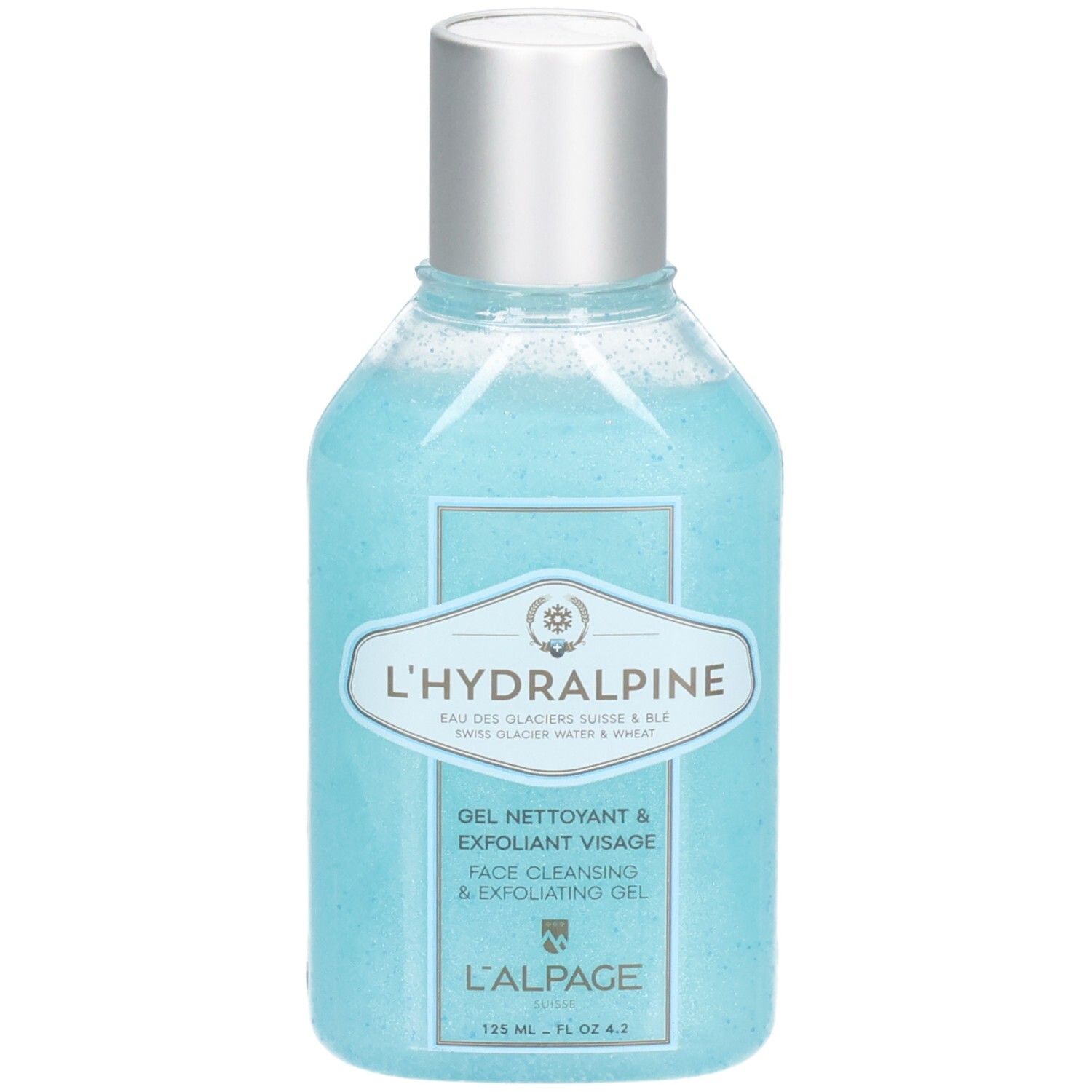 Blauwe gel in een fles met zilveren dop. Opschrift: L'Hydralpine, Gel Nettoyant & Exfoliant Visage, Face Cleansing & Exfoliating Gel.