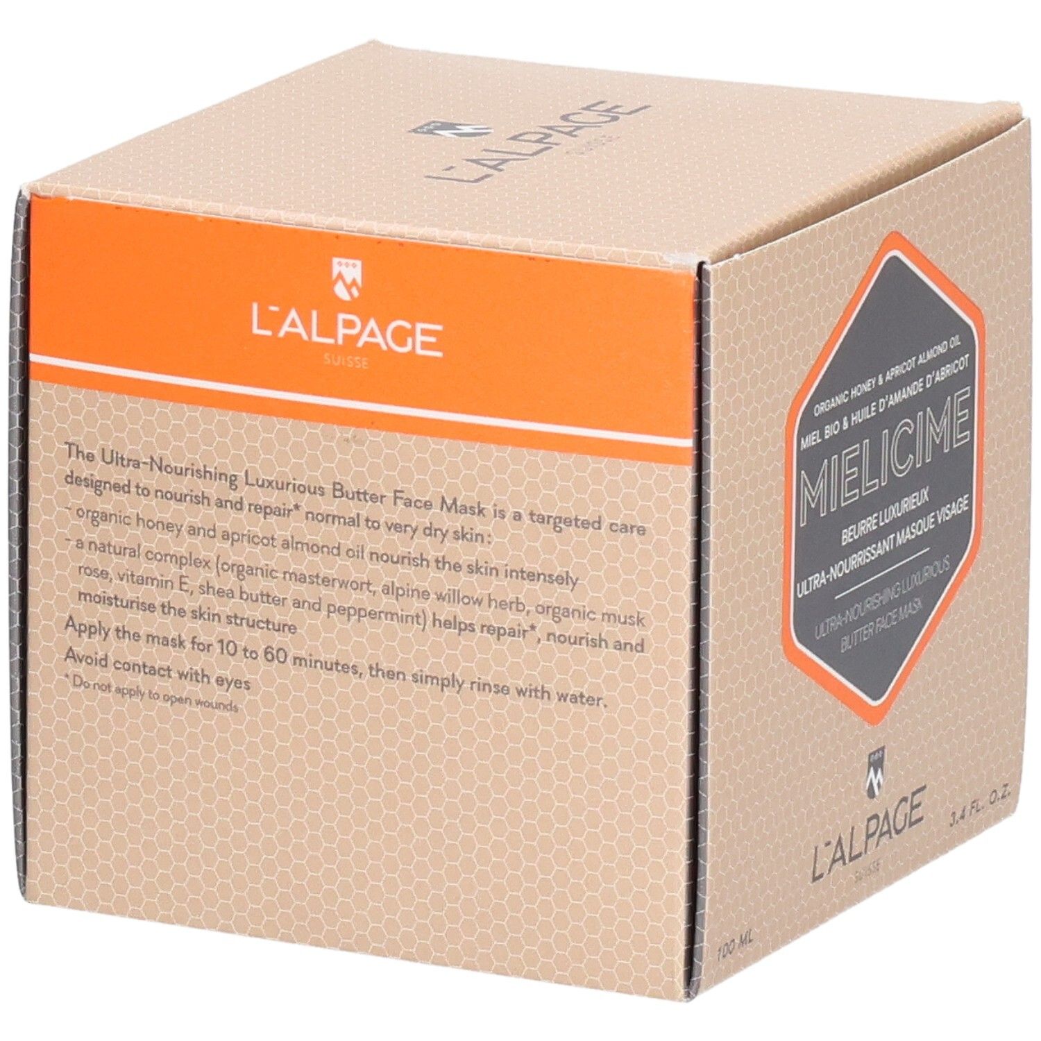 Kartonnen verpakking met productbeschrijving. Oranje accent. Tekst: Ultra-voedend gezichtsmasker. Merk: L'ALPAGE.