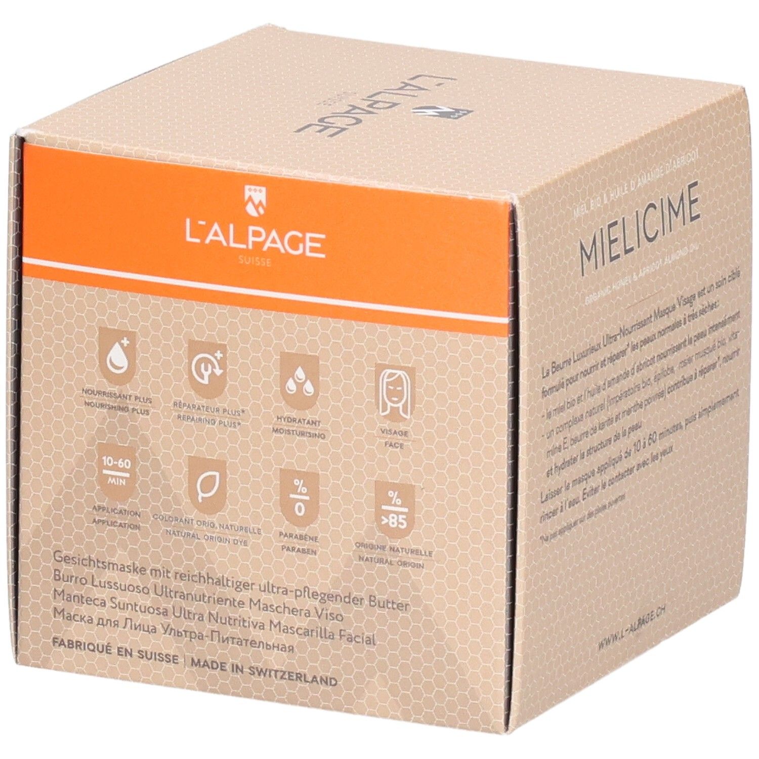 Kartonnen verpakking met productbeschrijving en iconen. Oranje accent. Tekst: Gezichtsmasker. Merk: L'ALPAGE.