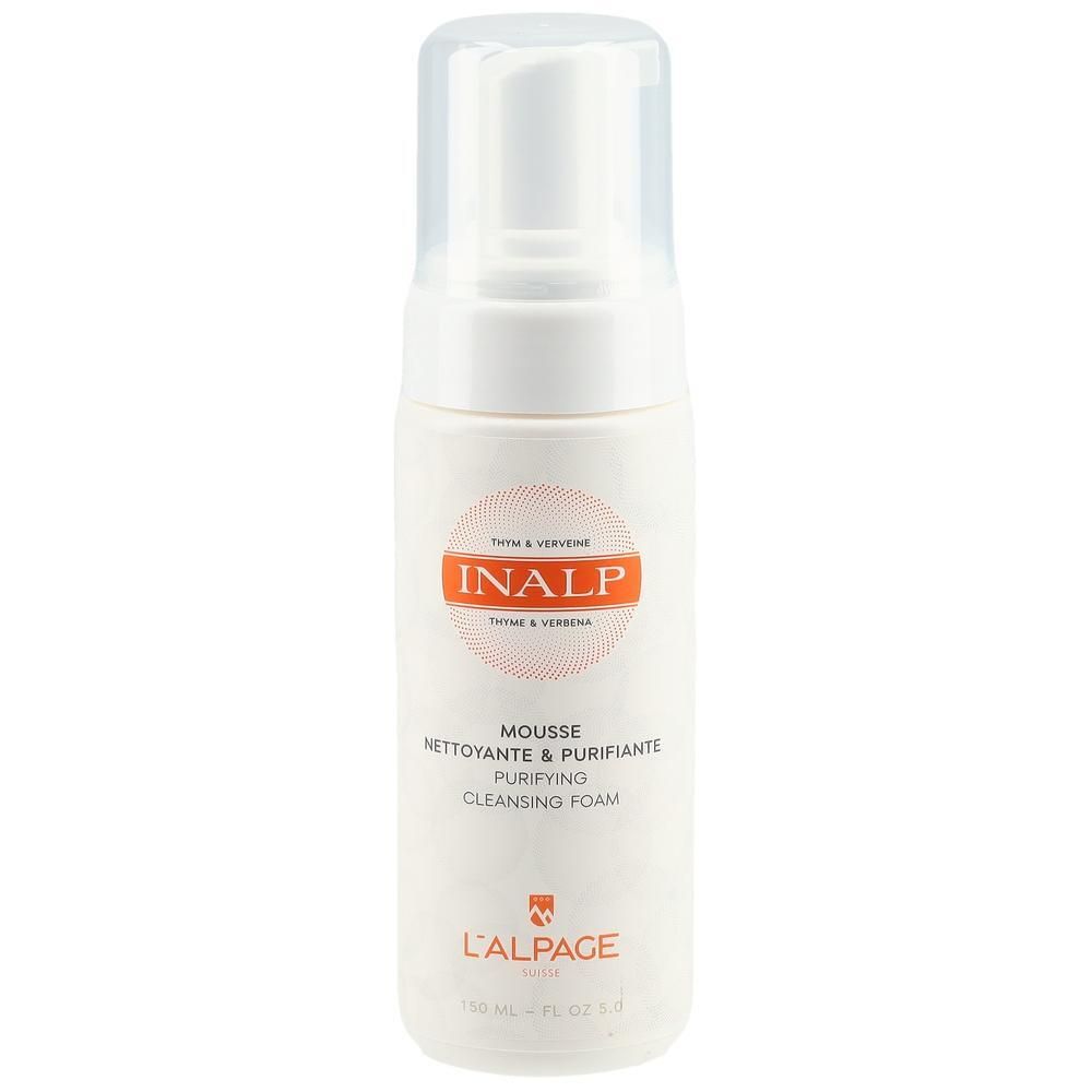 Flacon blanc avec pompe. Cercle orange avec logo INALP. Texte: Mousse Nettoyante & Purifiante, L'ALPAGE.