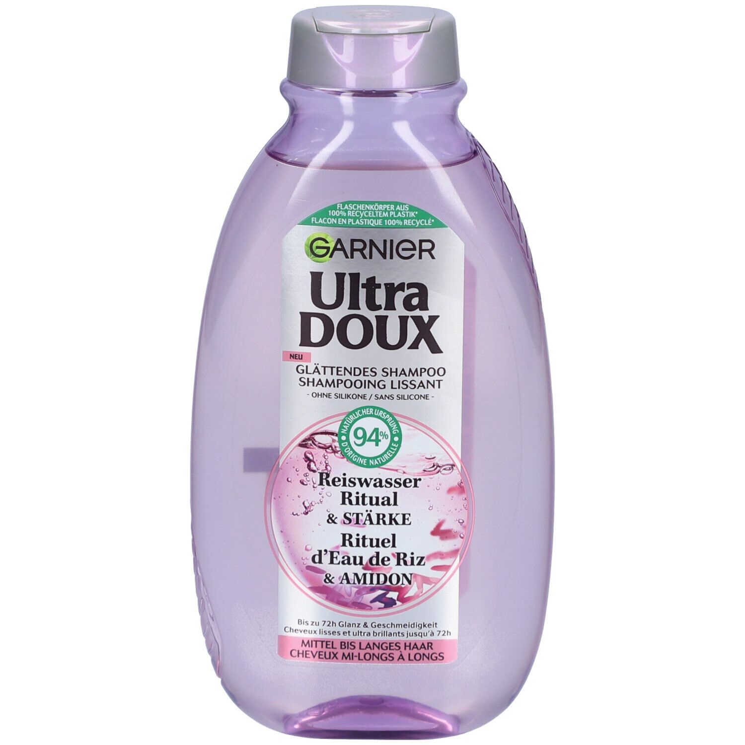 Paarse shampoo fles, Garnier Ultra Doux. Label met productnaam, Rijstwater Ritual & Sterkte. 94% ingrediënten van natuurlijke oorsprong.