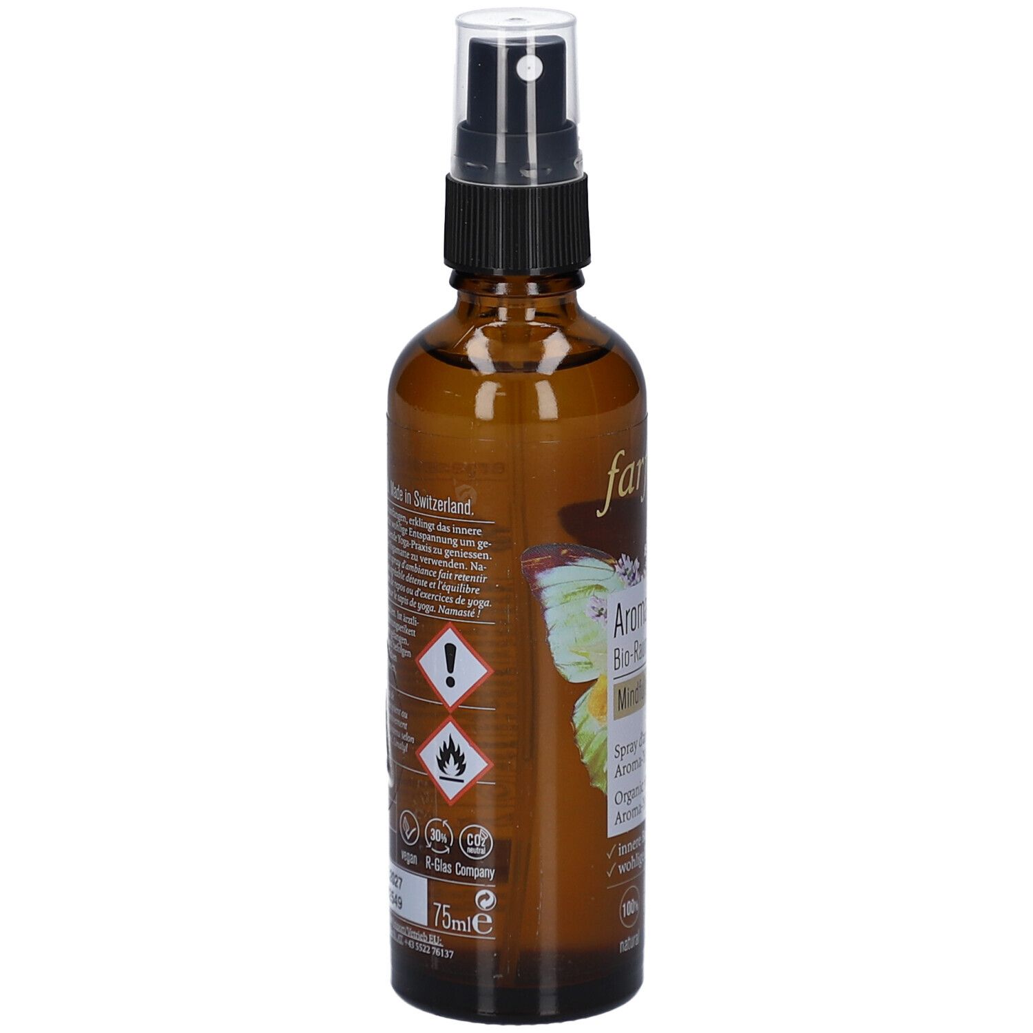 Bruine glazen fles met verstuiver. Achterkant met tekst en gevaarsymbolen. Opschrift: 75ml.