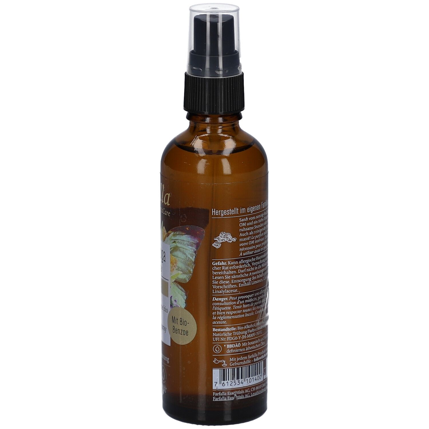 Bruine glazen fles met verstuiver. Achterkant met tekst en gevaarsymbolen. Opschrift: 75ml.